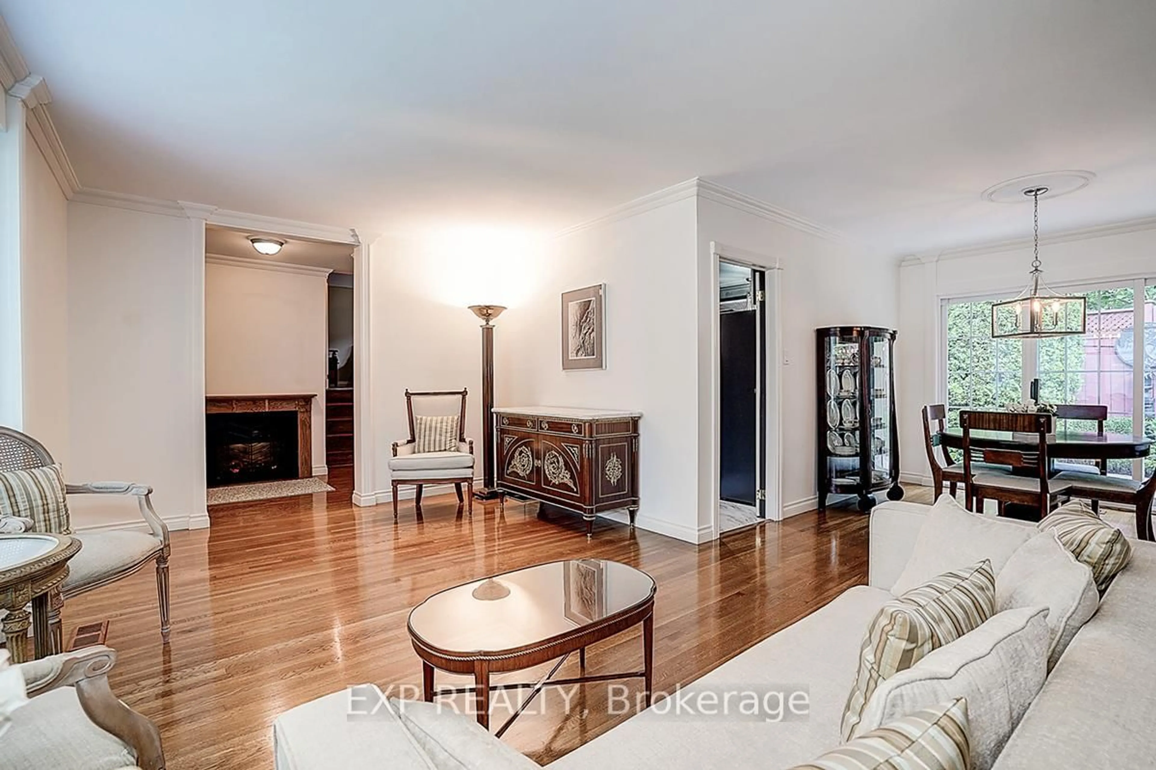 Living room with furniture, wood/laminate floor for 62 Kempsell Cres, Toronto Ontario M2J 2Z7