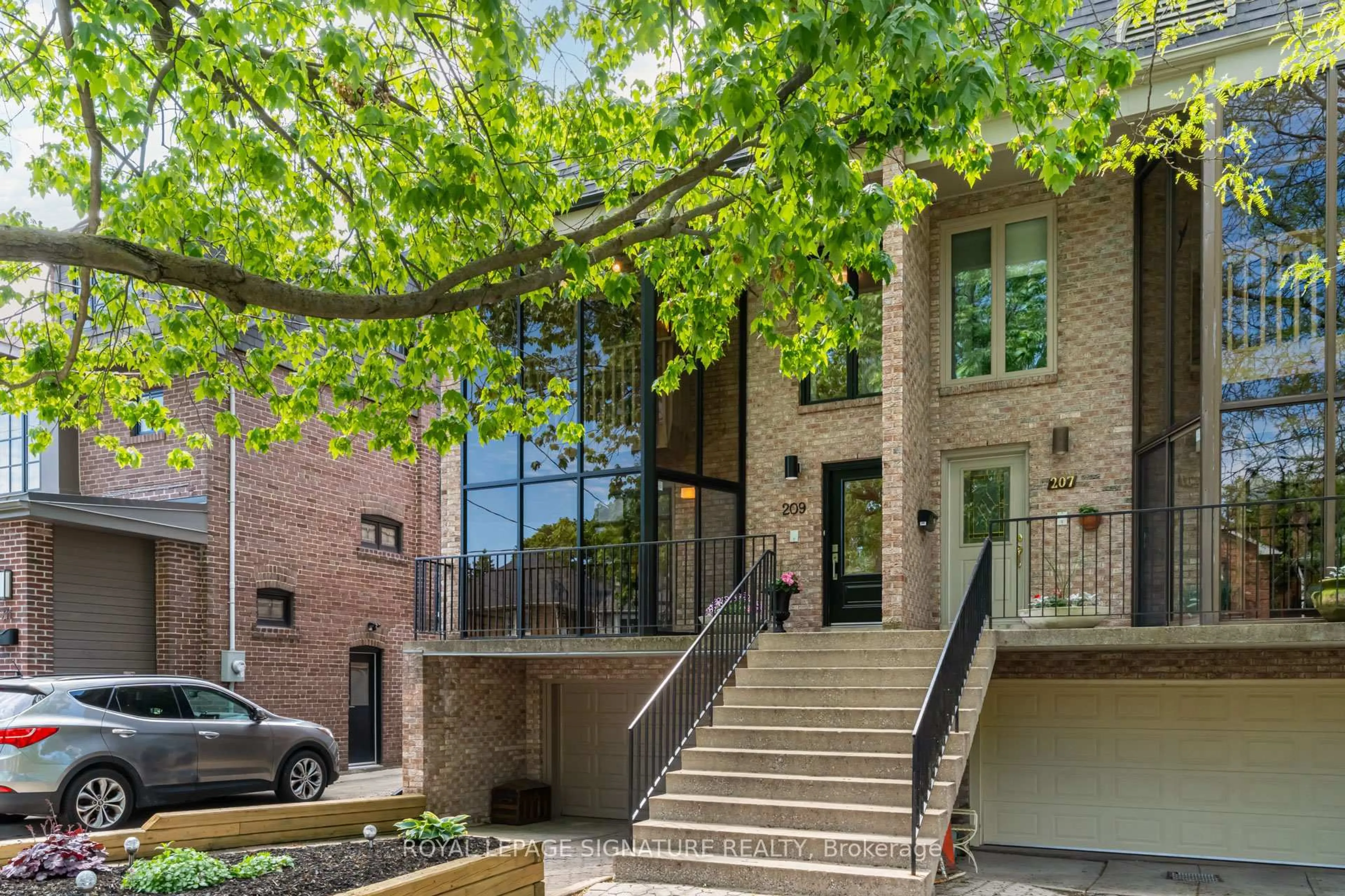 Home with brick exterior material, street for 209 Ranleigh Ave, Toronto Ontario M4N 1X3