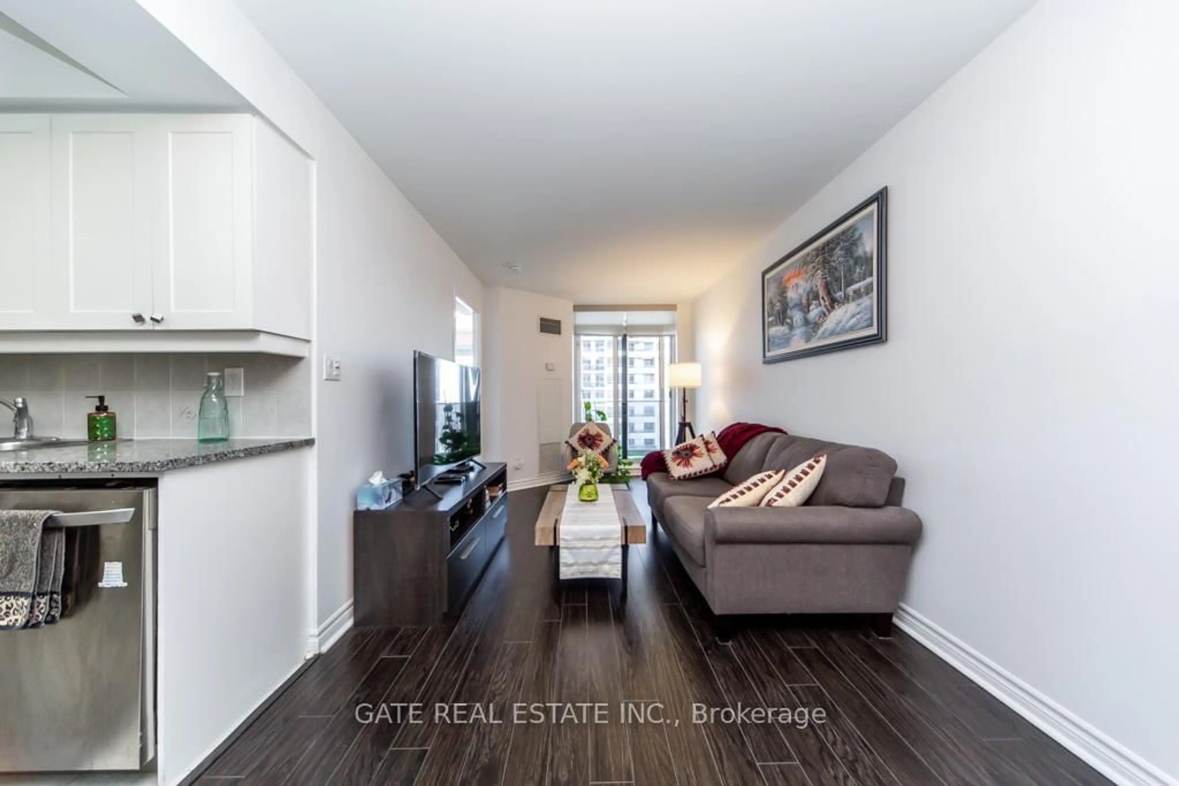 Living room with furniture, wood/laminate floor for 1 Rean Dr #1905, Toronto Ontario M2K 3C1