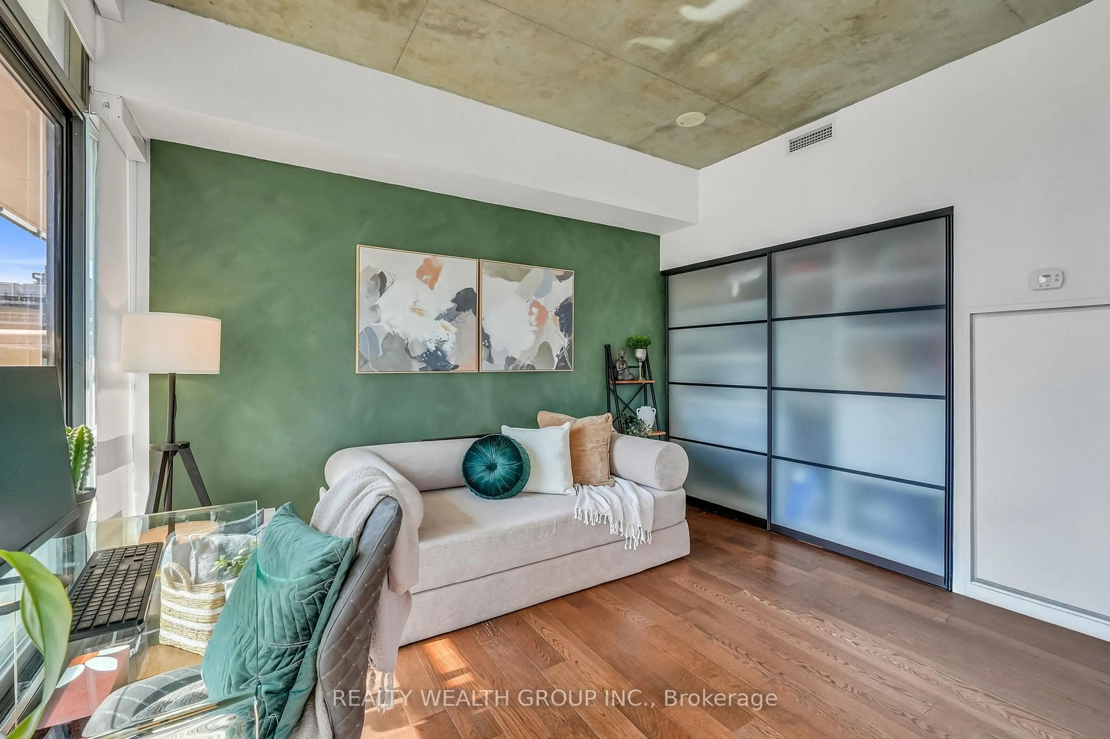 Living room with furniture, cement floor for 33 Mill St #706, Toronto Ontario M5A 3R3