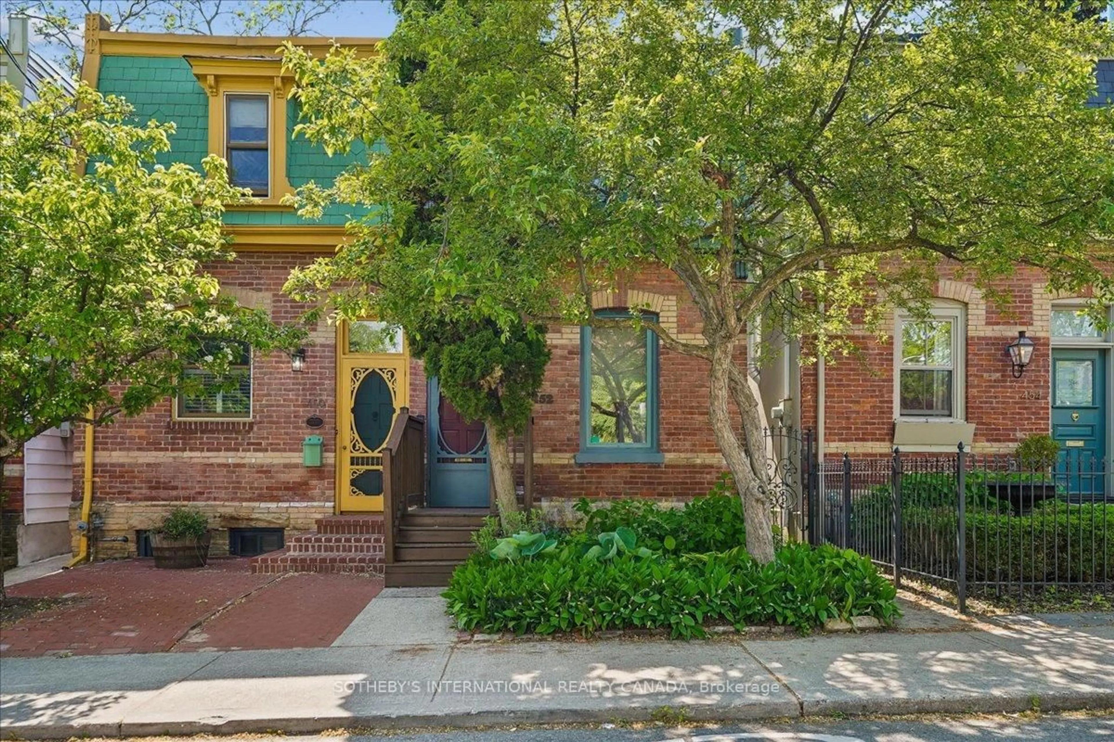 Home with brick exterior material, street for 452 Sumach St, Toronto Ontario M4X 1V7