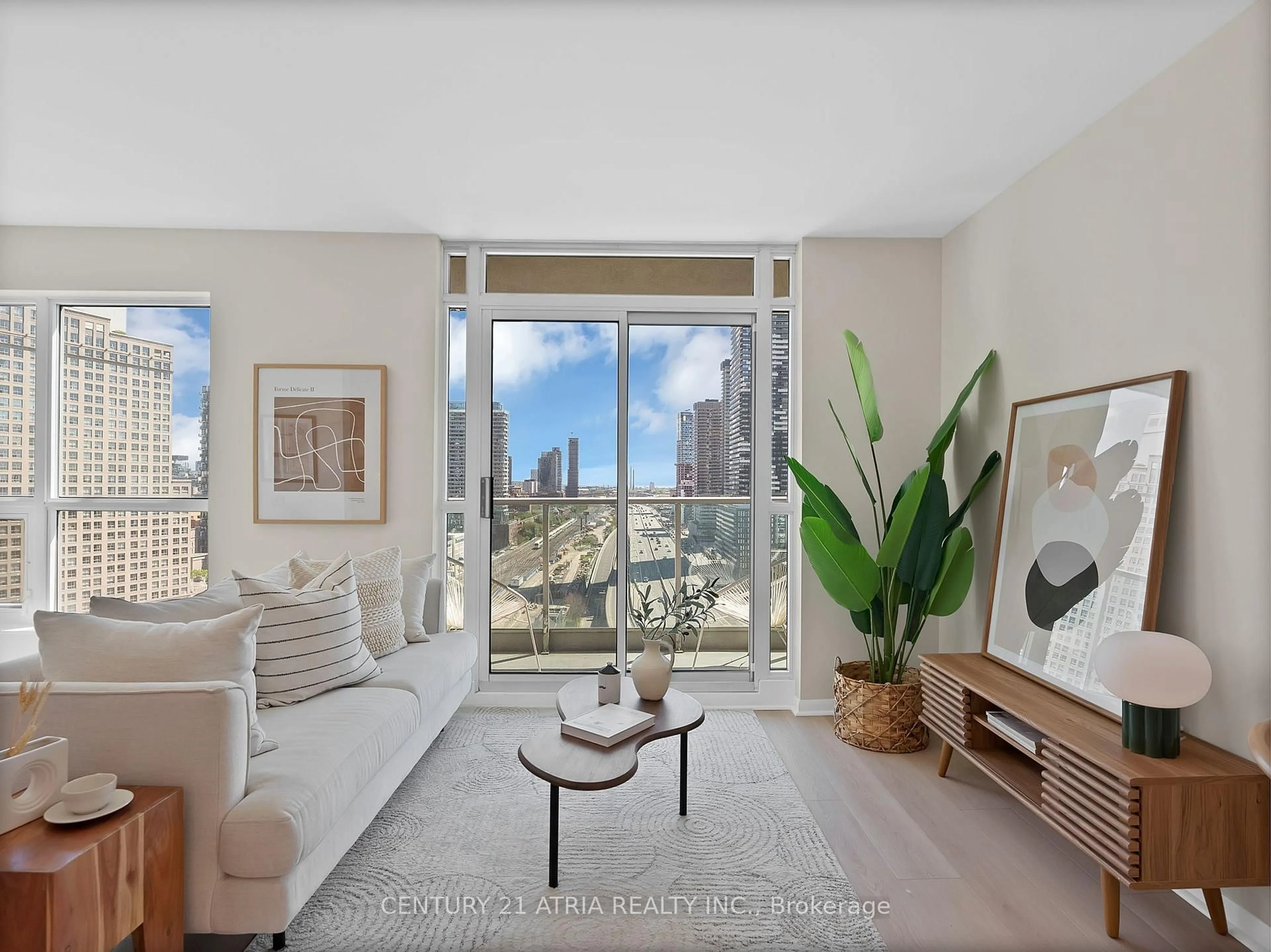 Living room with furniture, unknown for 18 Yonge St #1806, Toronto Ontario M5E 1R4