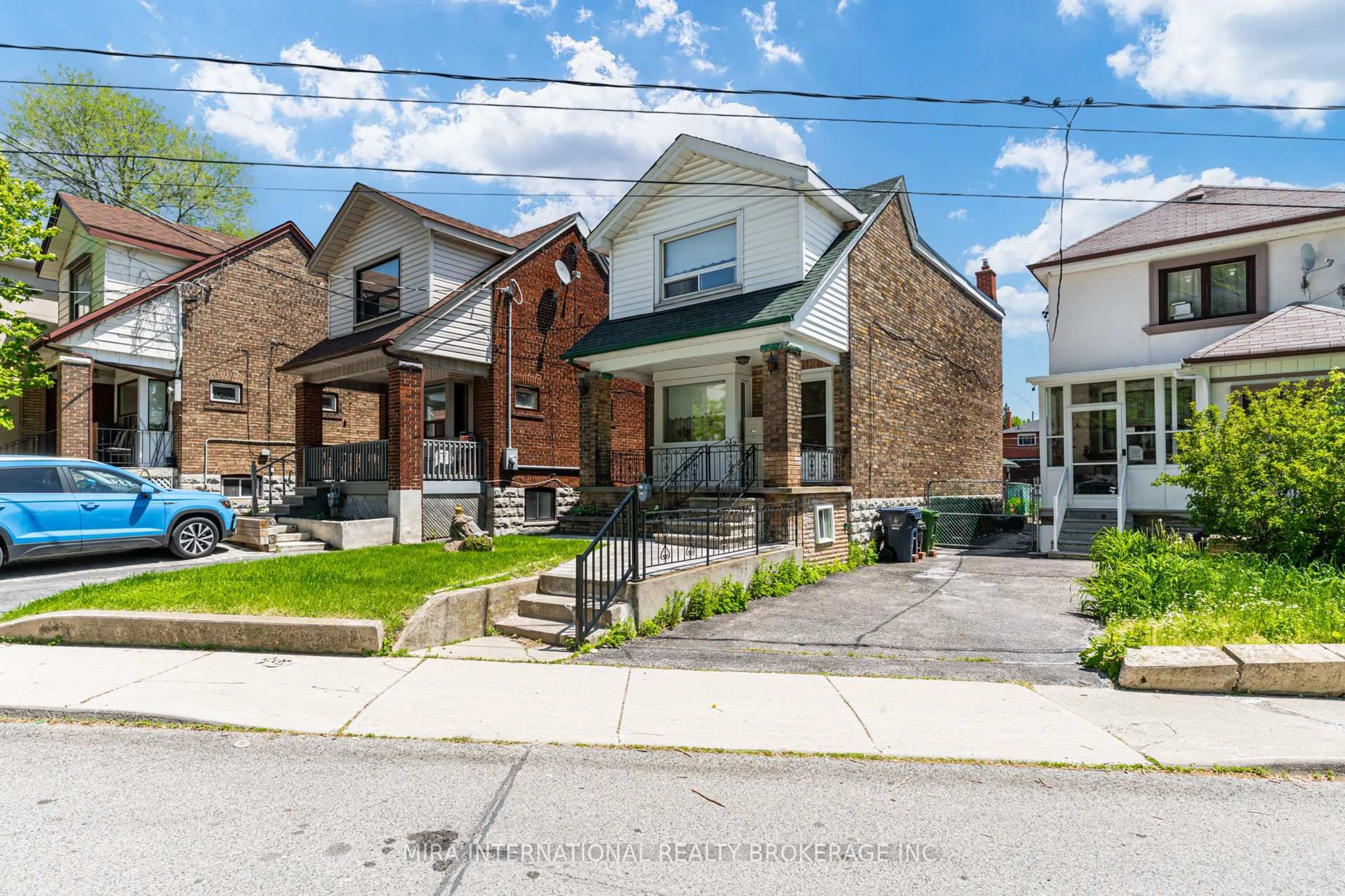 Home with brick exterior material, street for 631 Lauder Ave, Toronto Ontario M6E 3J8