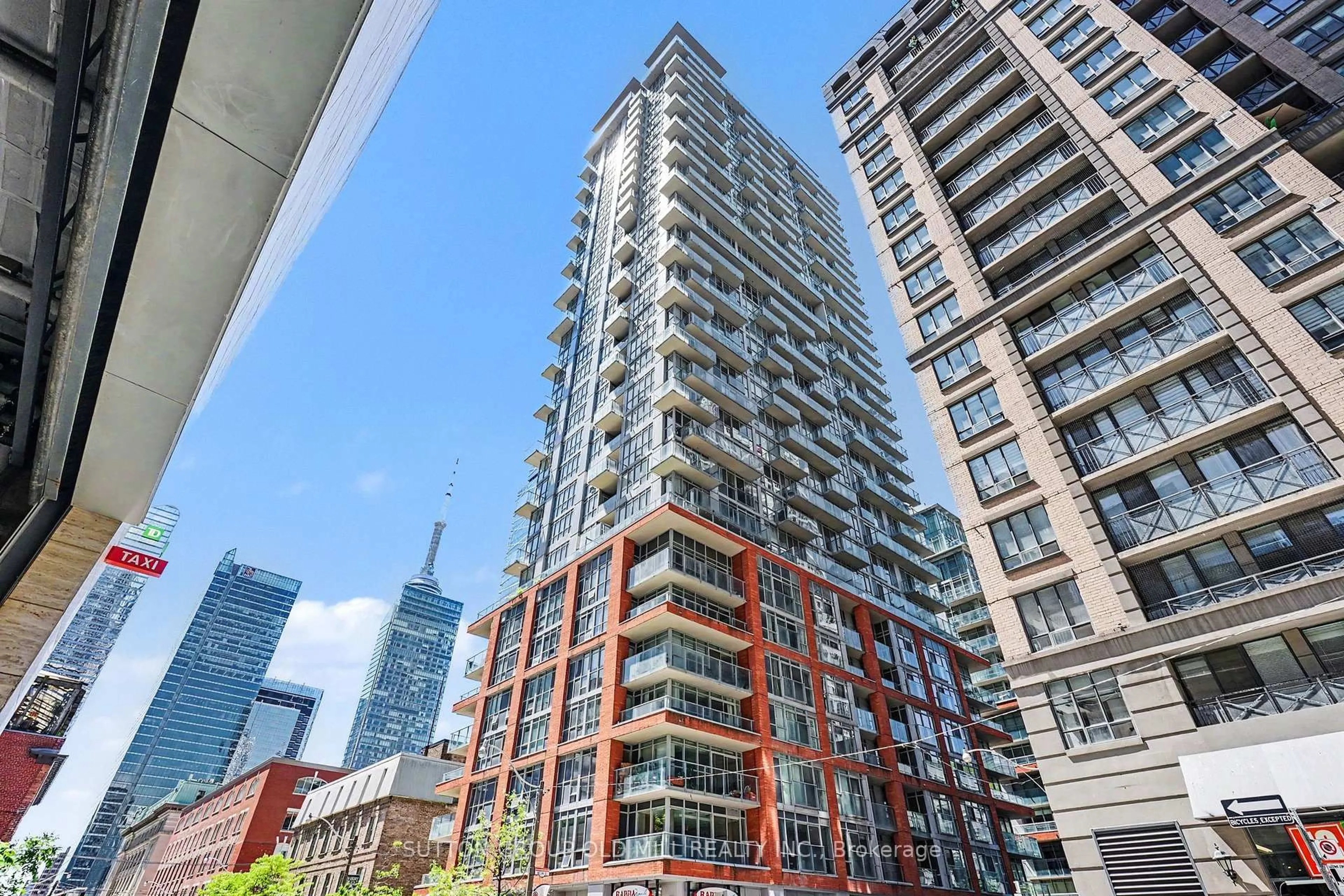 Patio, city buildings view from balcony for 126 Simcoe St #713, Toronto Ontario M5H 4E6