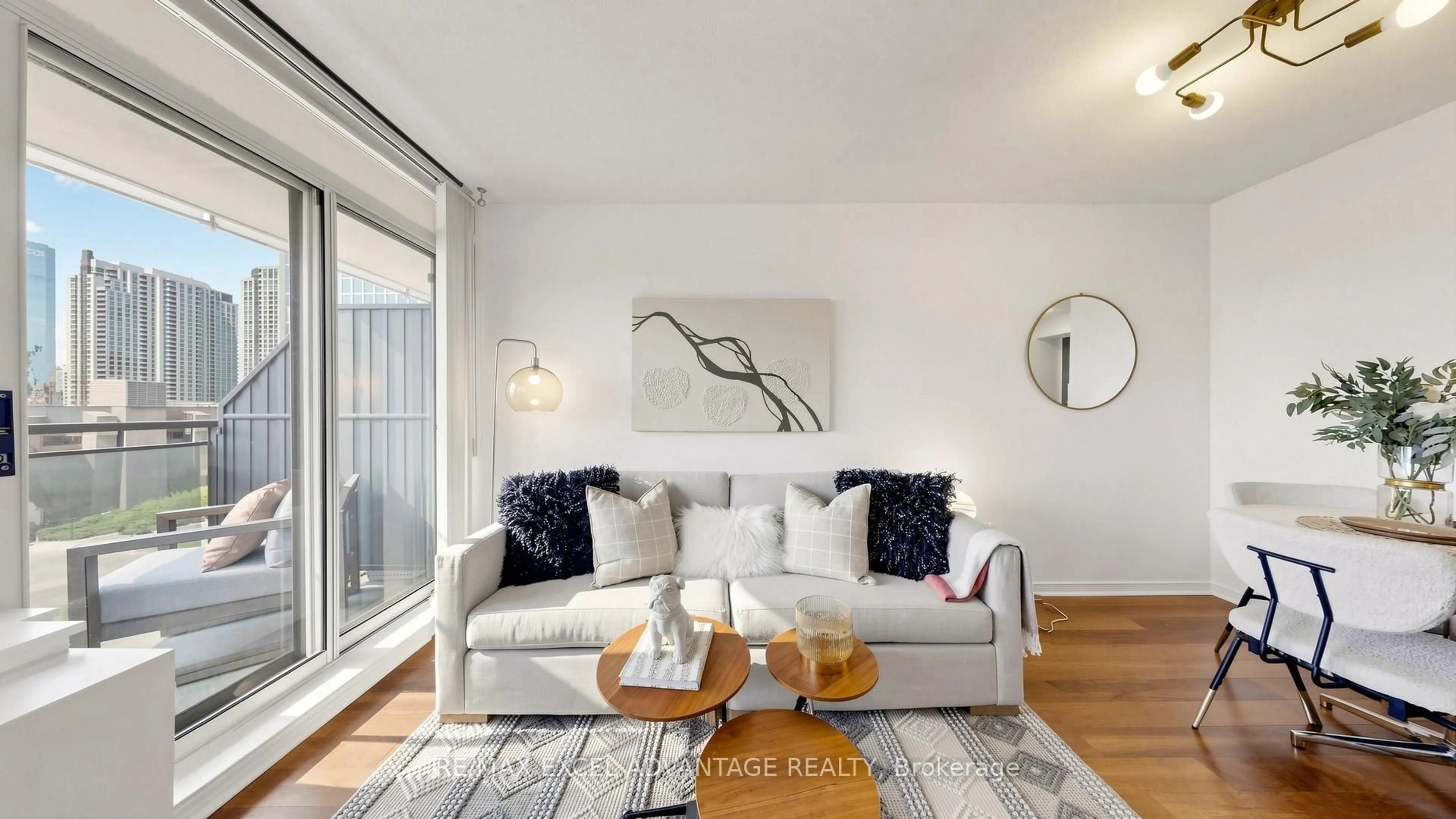 Living room with furniture, wood/laminate floor for 155 Beecroft Rd #1007, Toronto Ontario M2N 7C6