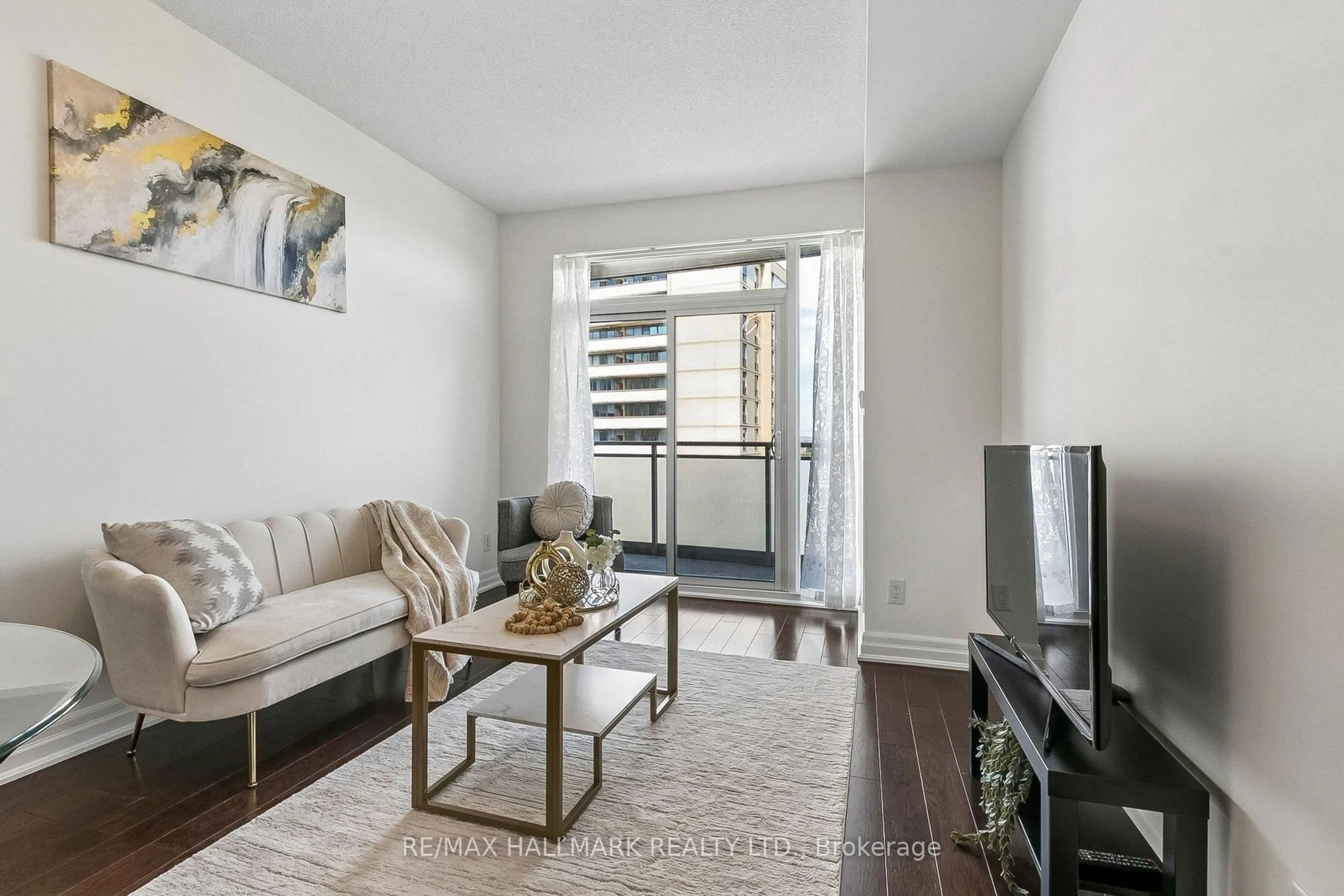 Living room with furniture, unknown for 17 Ruddington Dr #705, Toronto Ontario M2K 0A8