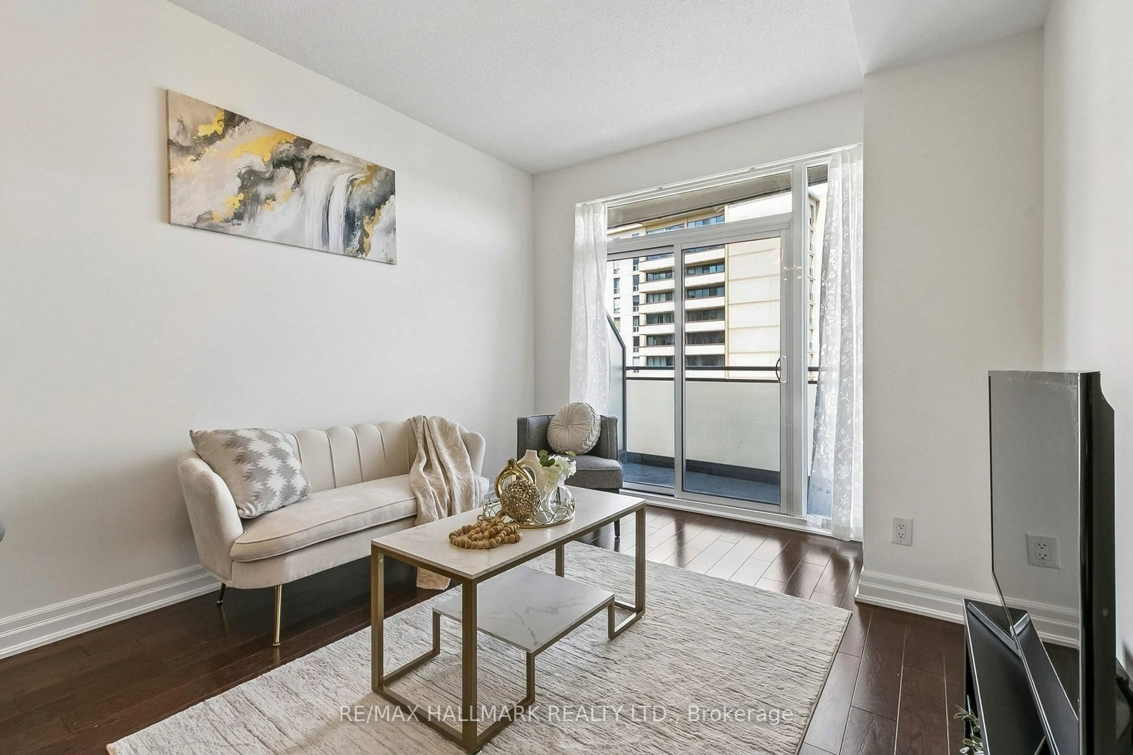 Living room with furniture, unknown for 17 Ruddington Dr #705, Toronto Ontario M2K 0A8