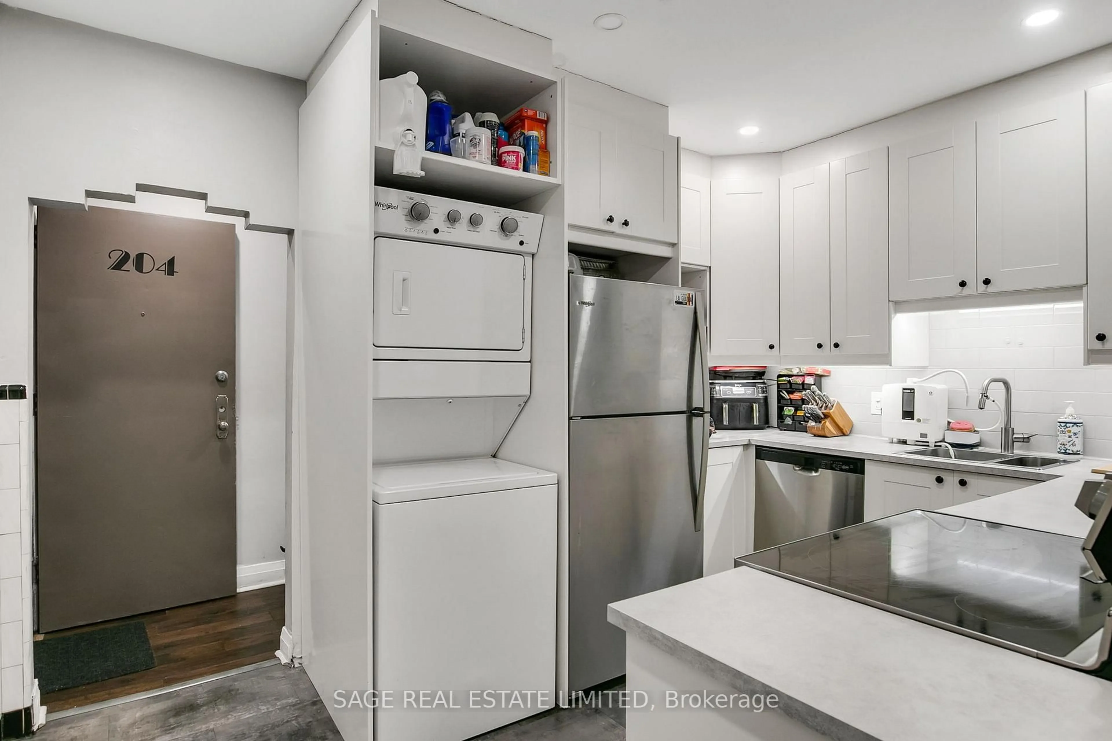 Kitchen with laundary machines, unknown for 1840 Bathurst St #204, Toronto Ontario M5P 3K7