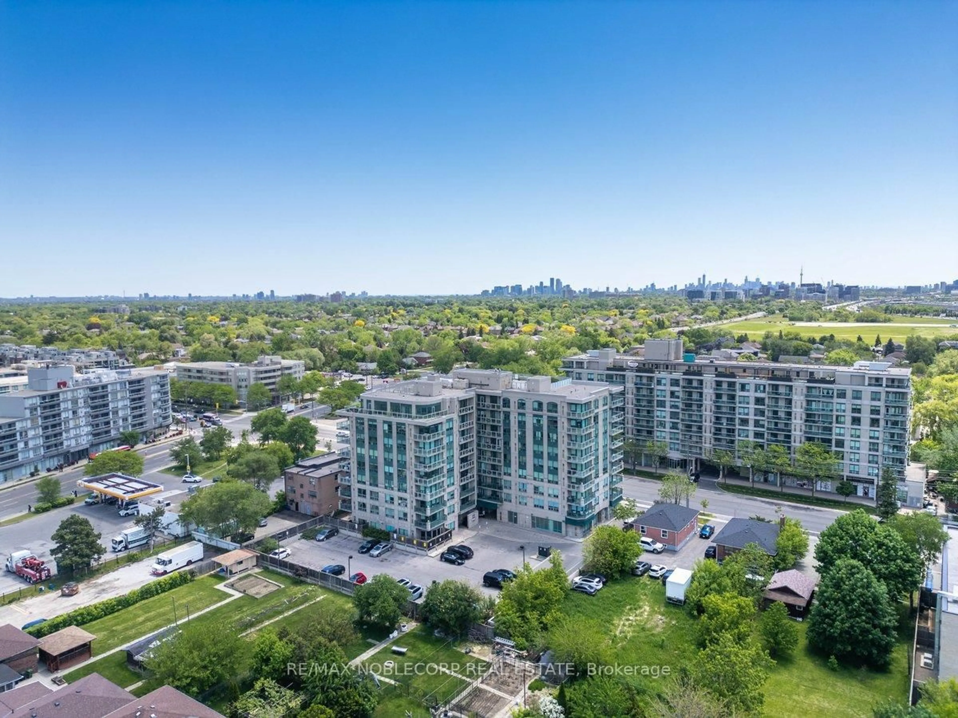 A pic from outside/outdoor area/front of a property/back of a property/a pic from drone, city buildings view from balcony for 920 Sheppard Ave #508, Toronto Ontario M3H 0A2