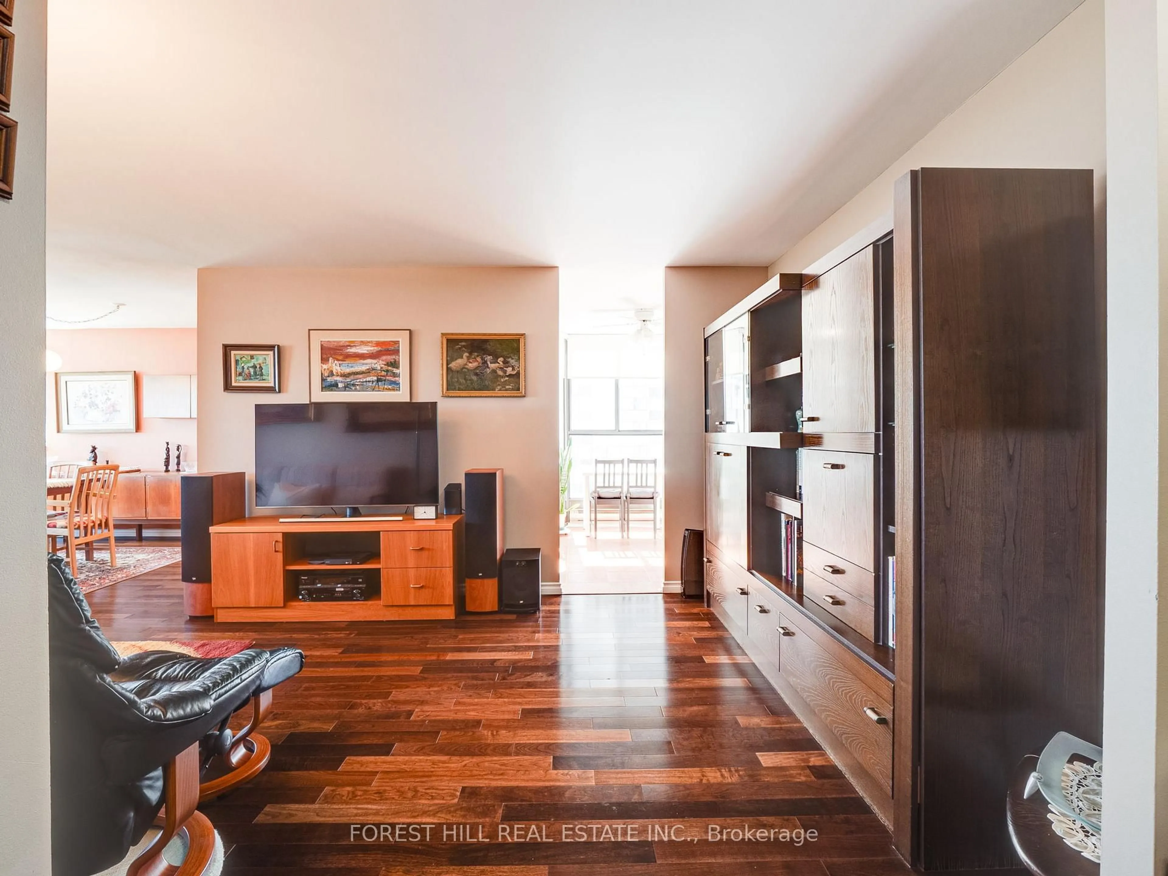 Living room with furniture, wood/laminate floor for 100 Antibes Dr #1706, Toronto Ontario M2R 3N1
