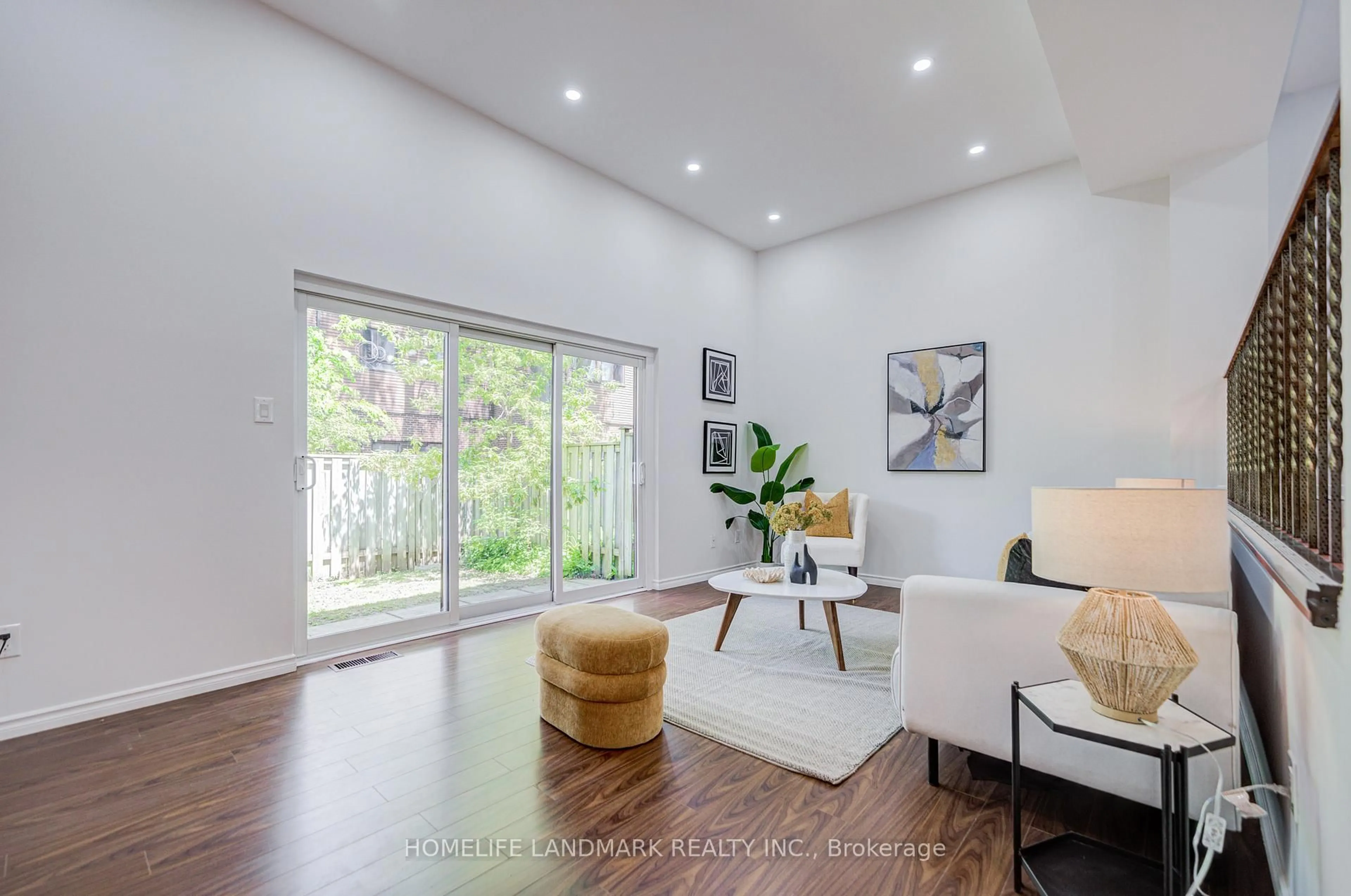 Living room with furniture, wood/laminate floor for 14 Low Meadoway, Toronto Ontario M2H 2V7