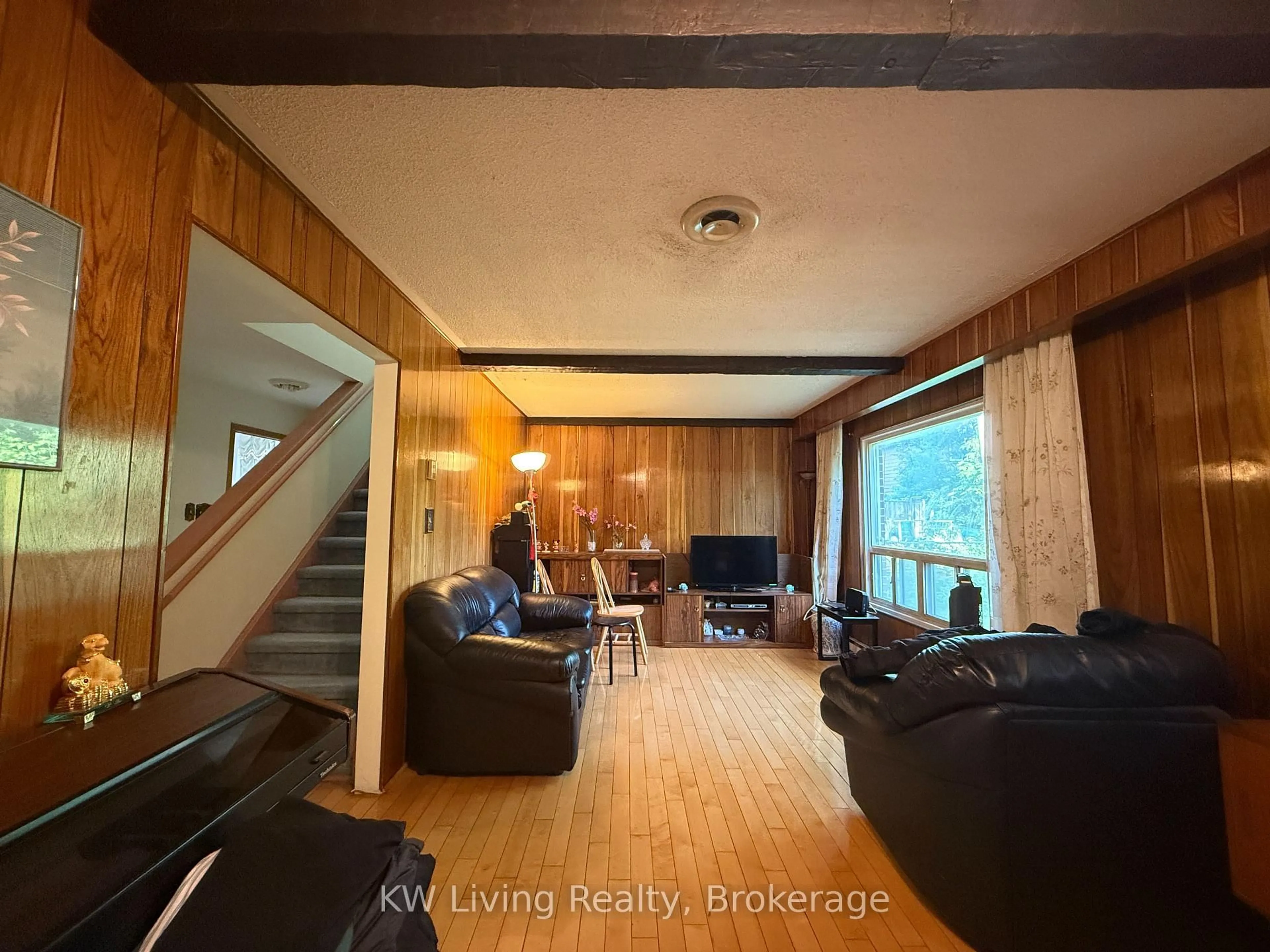 Living room with furniture, wood/laminate floor for 25 Yucatan Rd, Toronto Ontario M2H 2K9