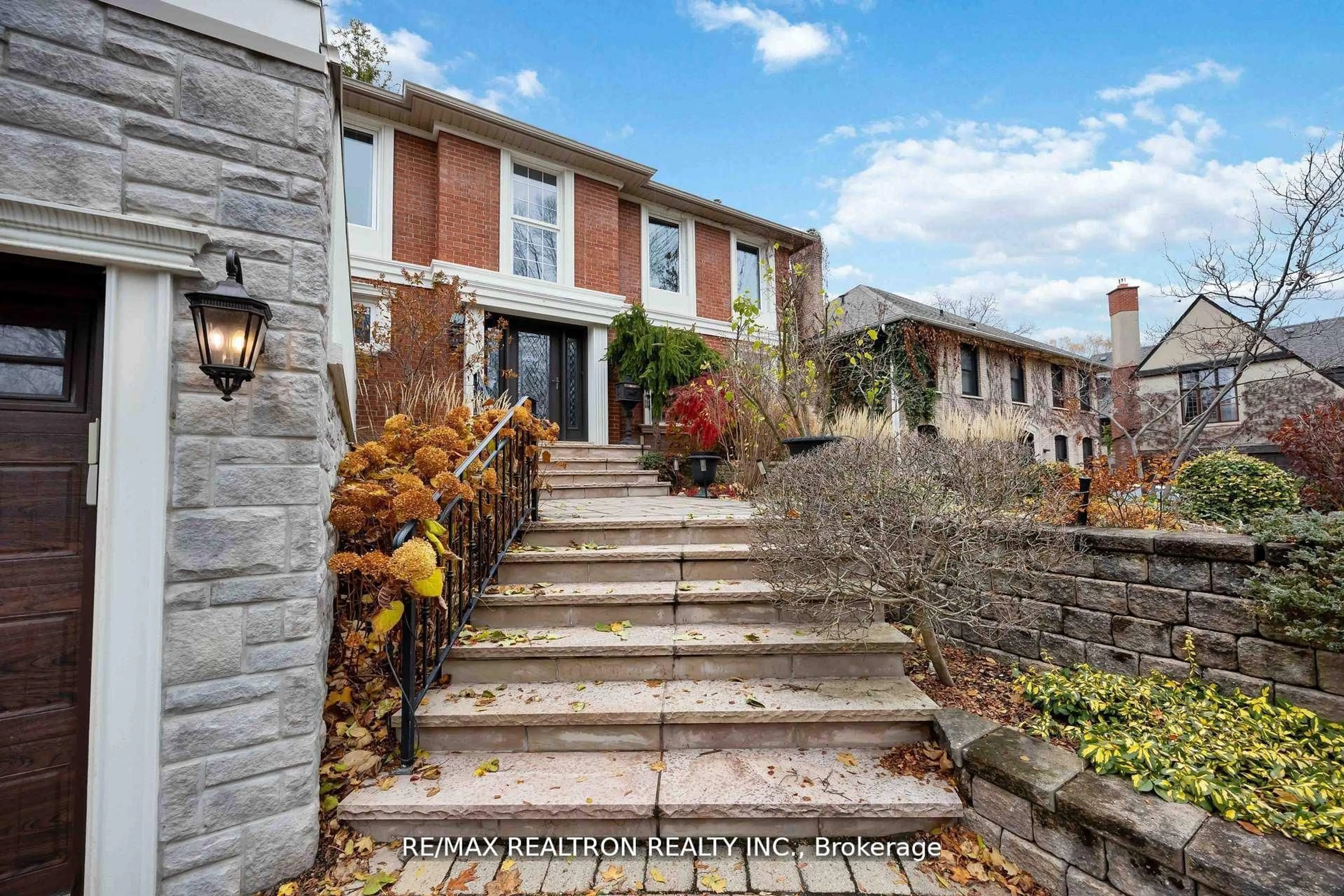 Home with brick exterior material, street for 12 Donwoods Dr, Toronto Ontario M4N 2G1