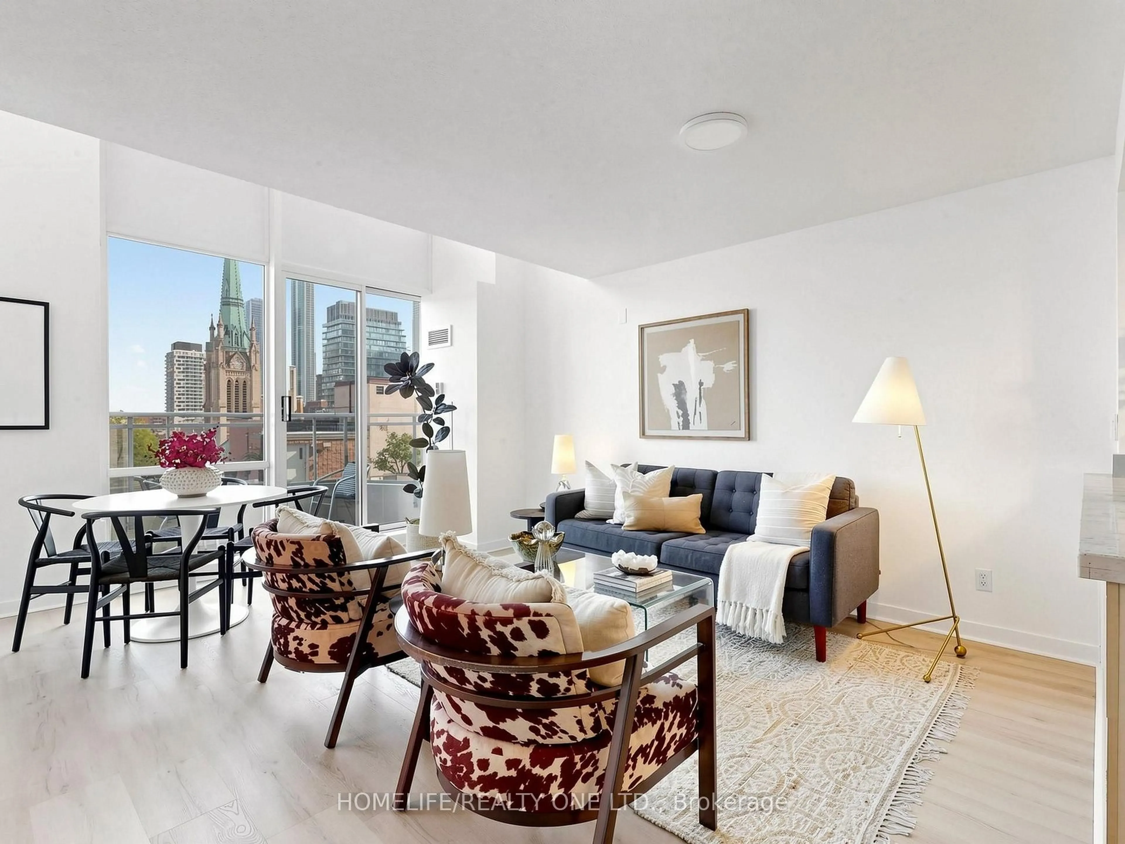 Living room with furniture, unknown for 77 Lombard St #913, Toronto Ontario M5C 3E1
