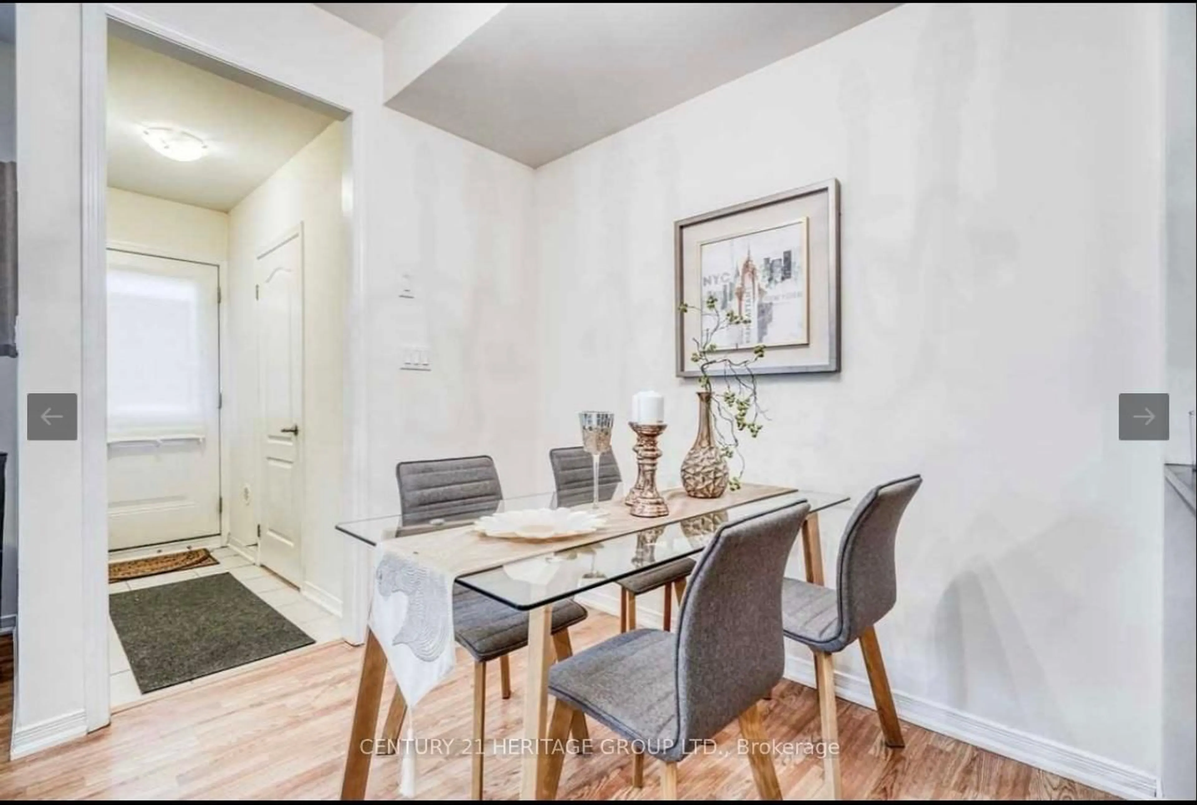 Dining room, wood/laminate floor for 21 Coneflower Cres #07, Toronto Ontario M2R 0A5
