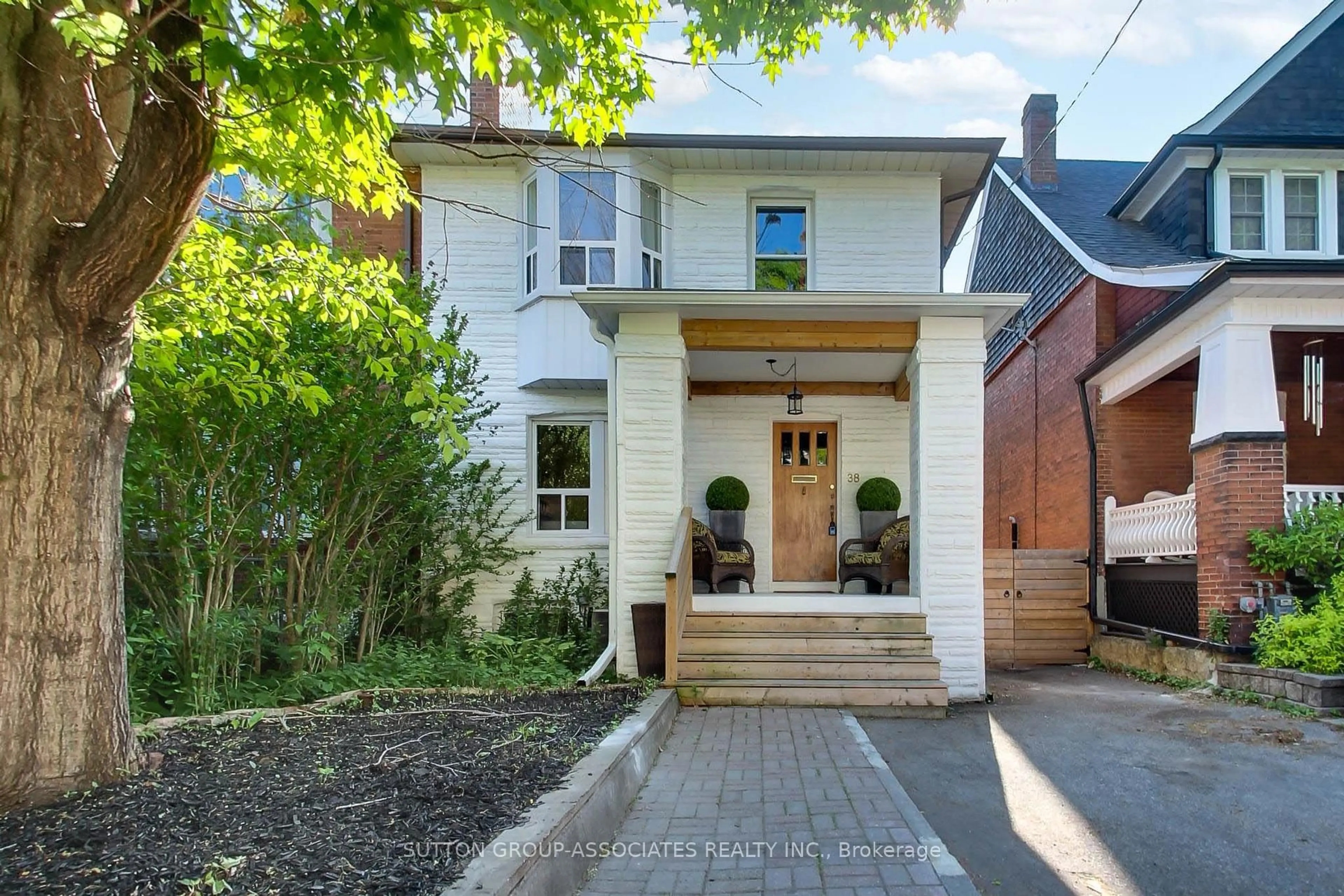 Home with brick exterior material, street for 38 Winona Dr, Toronto Ontario M6G 3S6