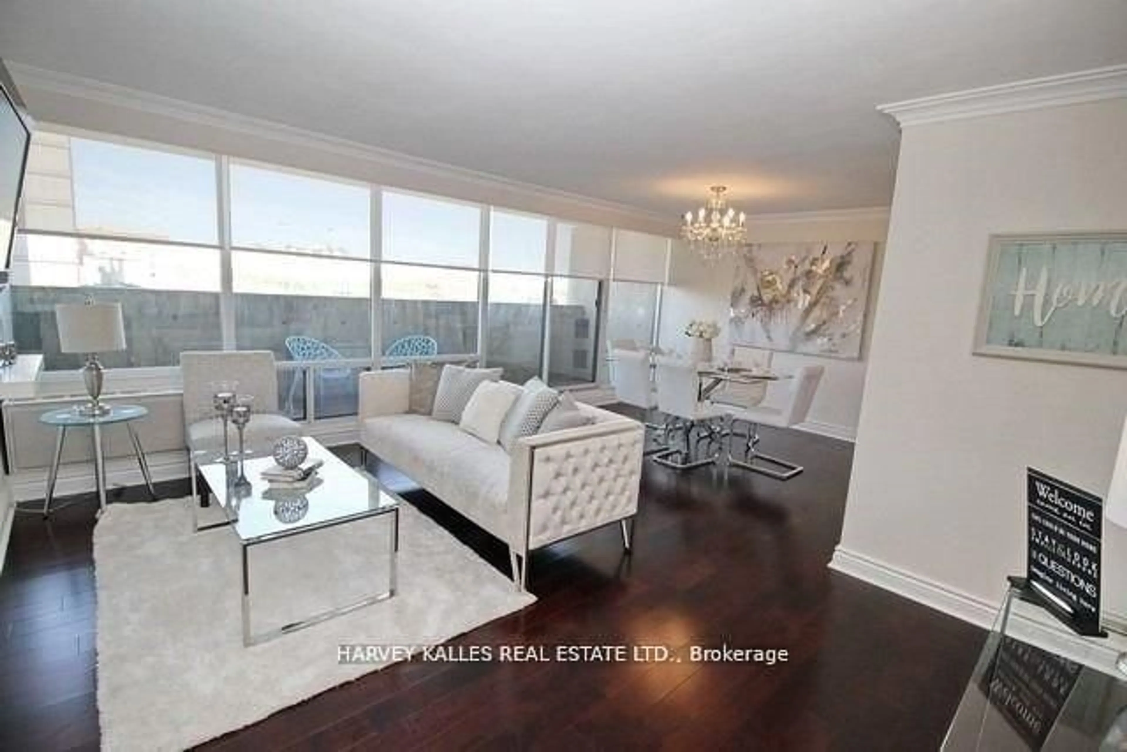 Living room with furniture, wood/laminate floor for 3555 Bathurst St #602, Toronto Ontario M6A 2Y8