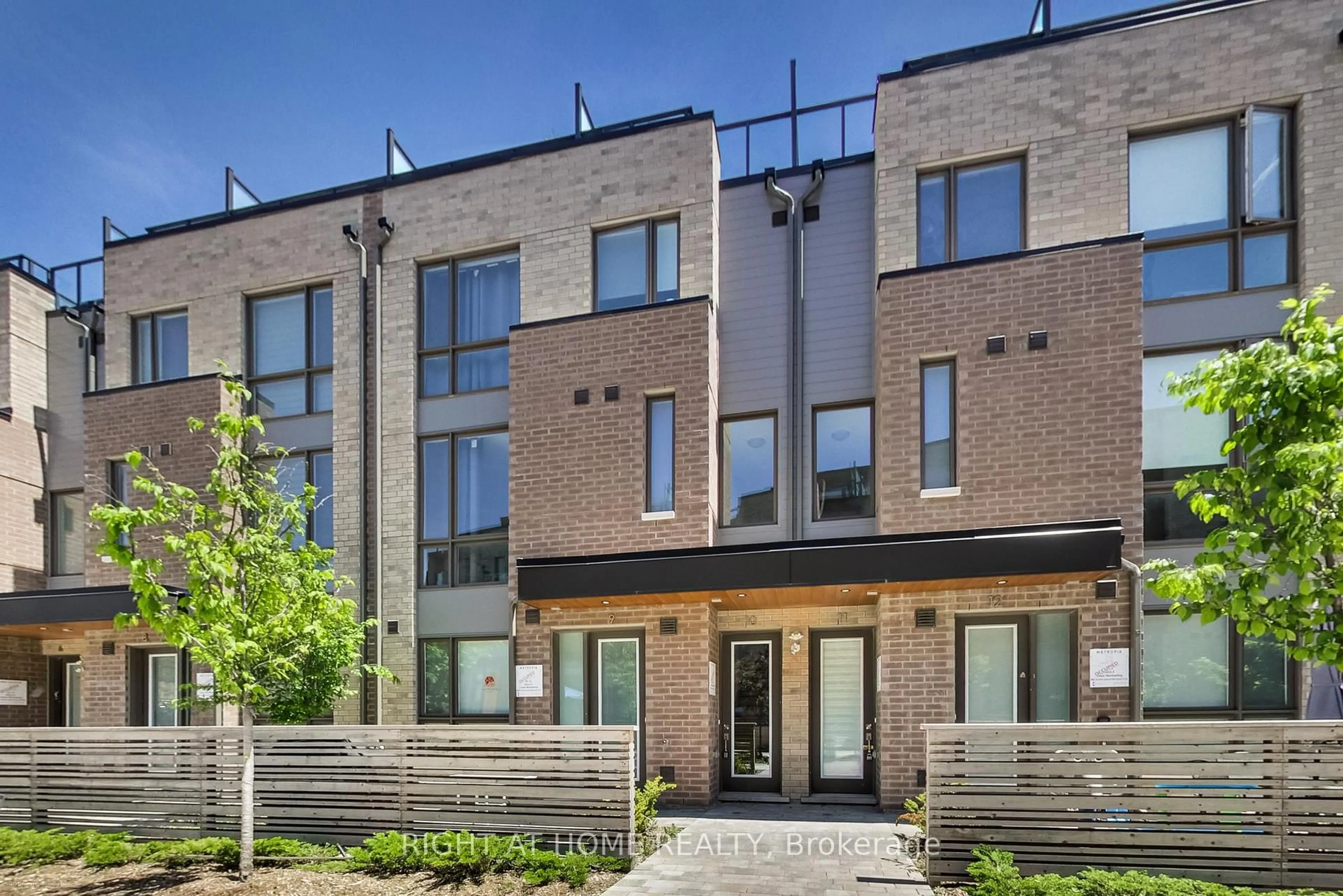 Home with brick exterior material, street for 88 Turtle Island Rd #10, Toronto Ontario M6A 0E4