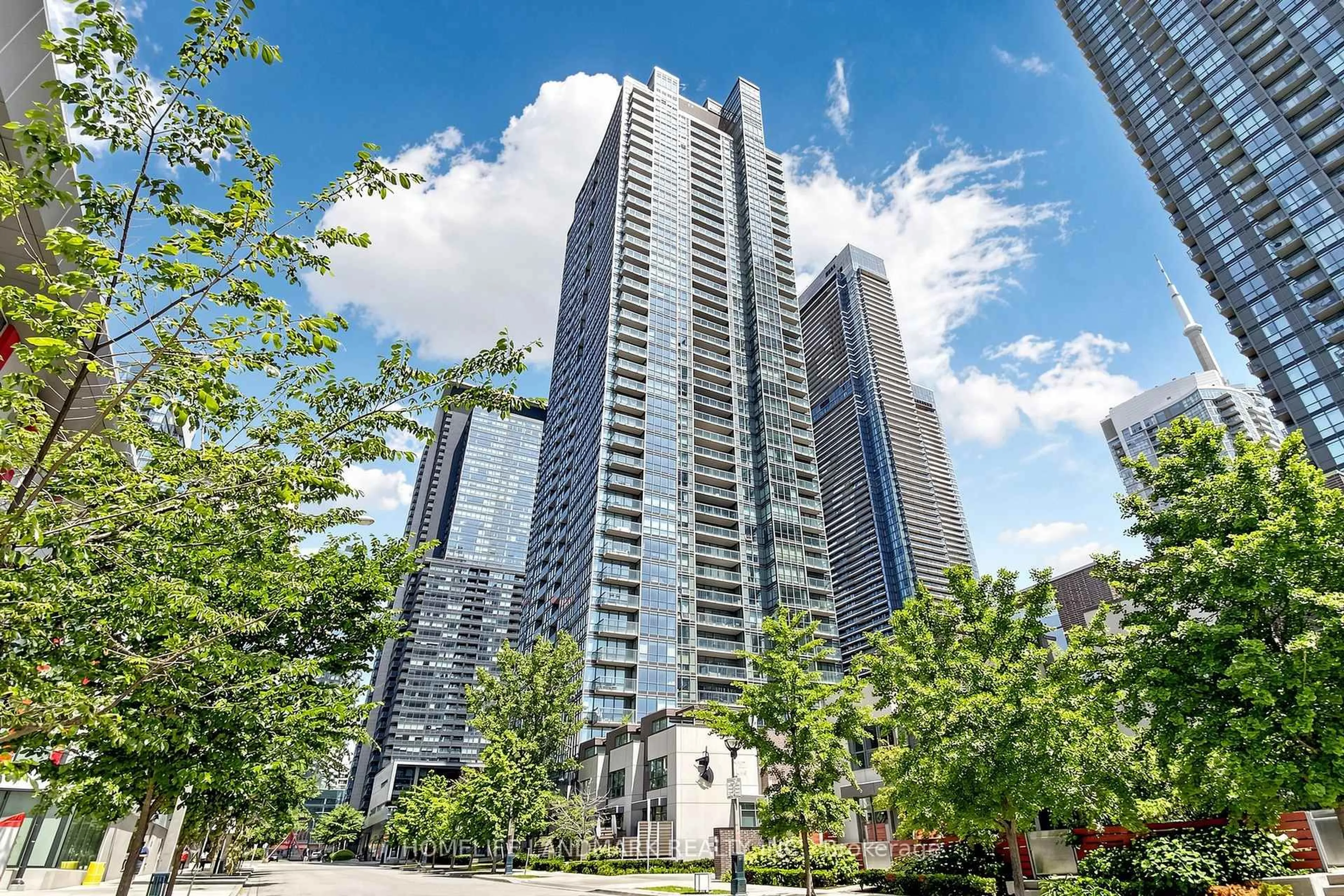 Patio, city buildings view from balcony for 15 Fort York Blvd #2811, Toronto Ontario M5V 3Y4
