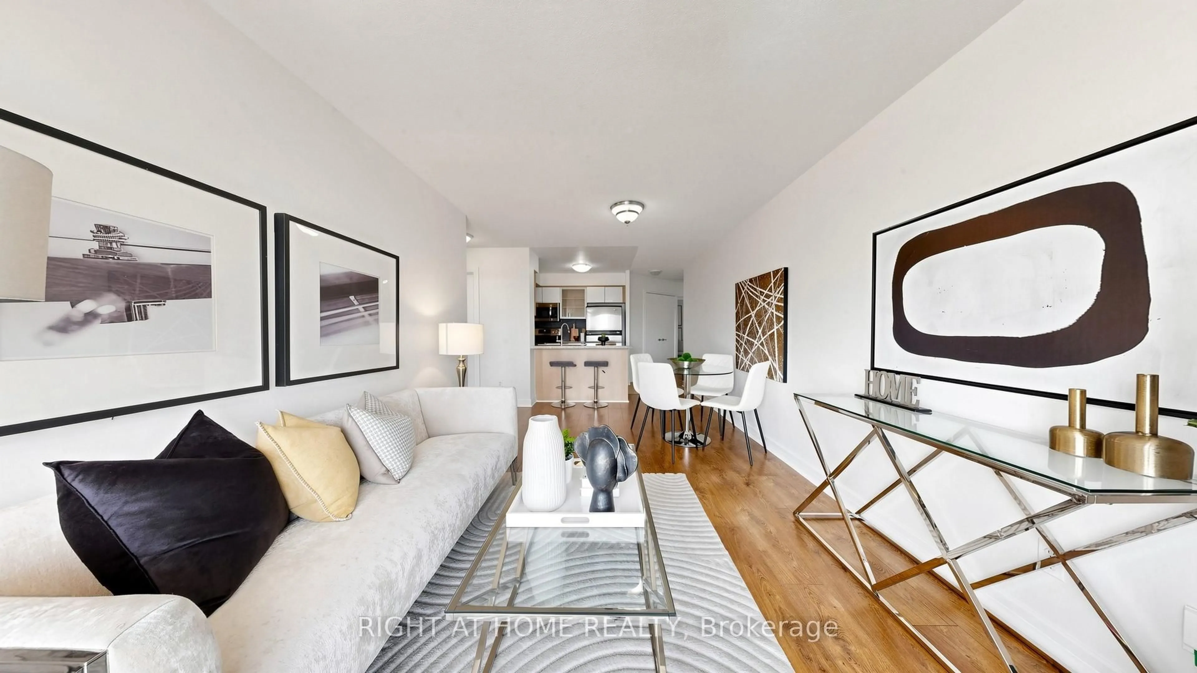 Living room with furniture, wood/laminate floor for 18 Harrison Garden Blvd #2308, Toronto Ontario M2N 7J7