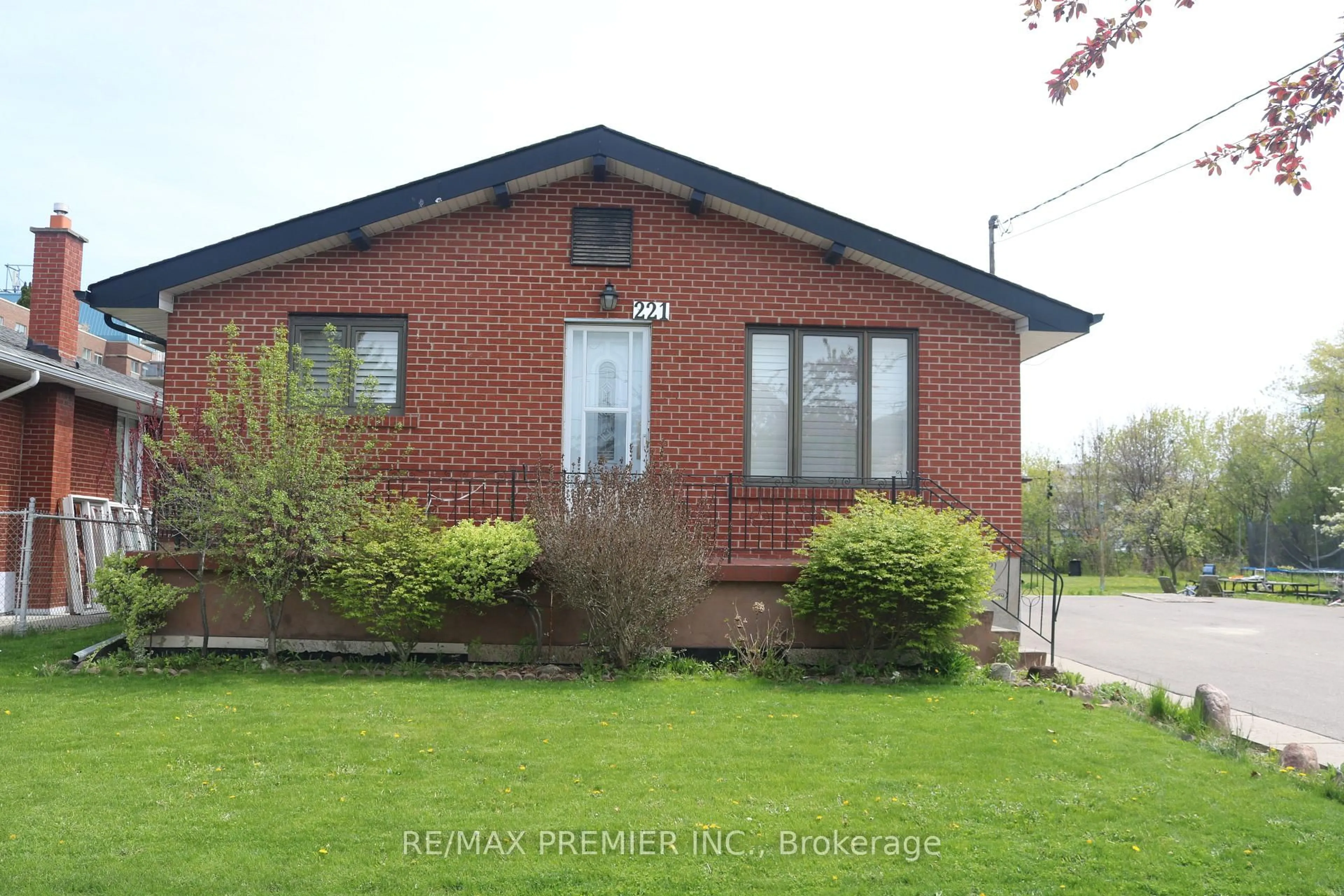 Home with brick exterior material, street for 221 Cocksfield Ave, Toronto Ontario M3H 3T6