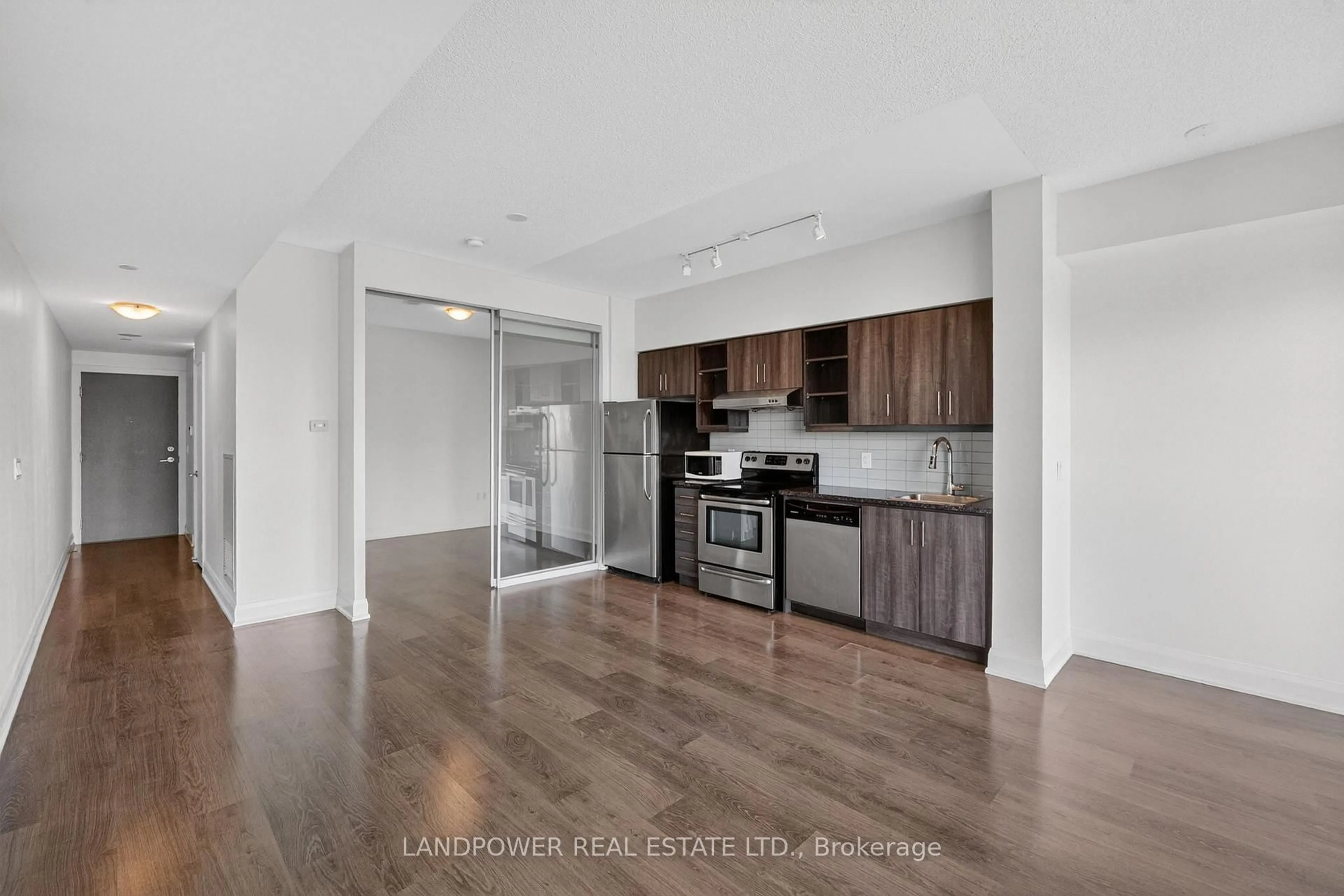 Open concept kitchen, wood/laminate floor for 160 Vanderhoof Ave #1203, Toronto Ontario M4G 0B7