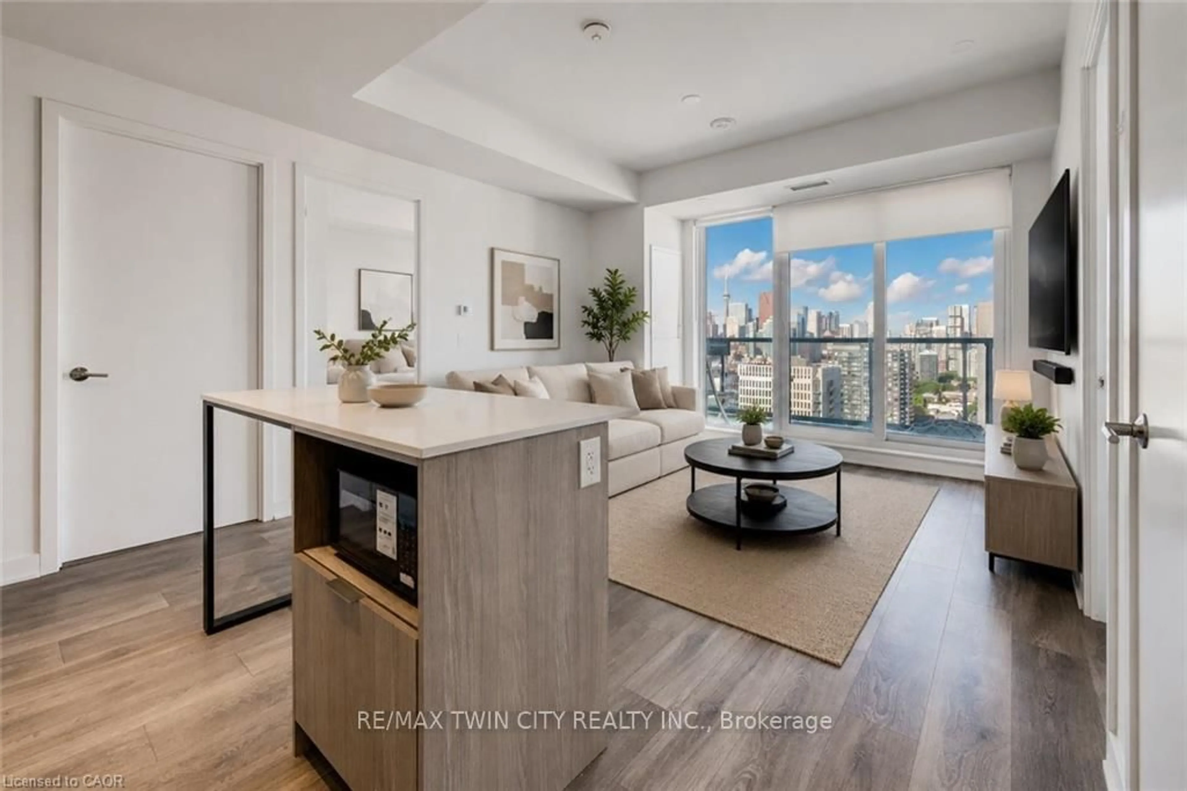 Living room with furniture, wood/laminate floor for 130 RIVER St #2904, Toronto Ontario M5A 0R8