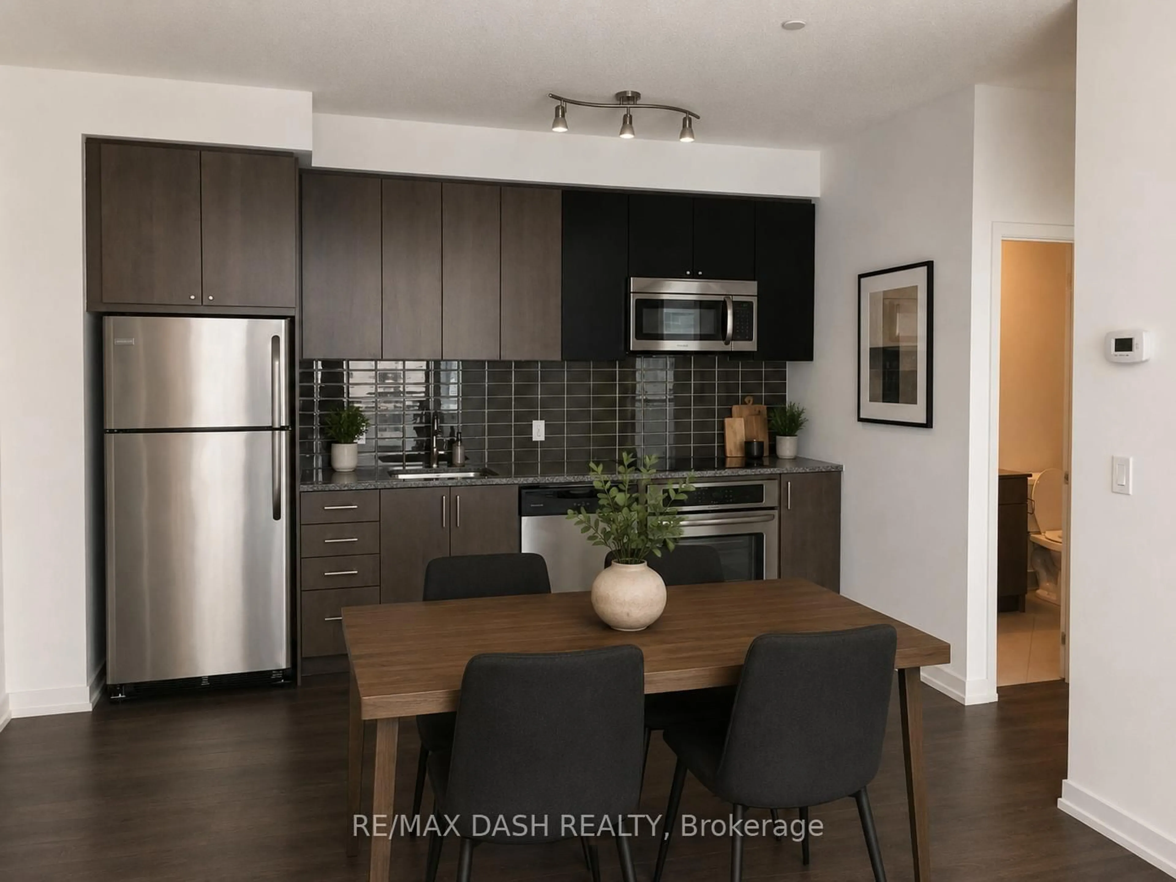 Open concept kitchen, wood/laminate floor for 89 Dunfield Ave, Toronto Ontario M4S 0A4