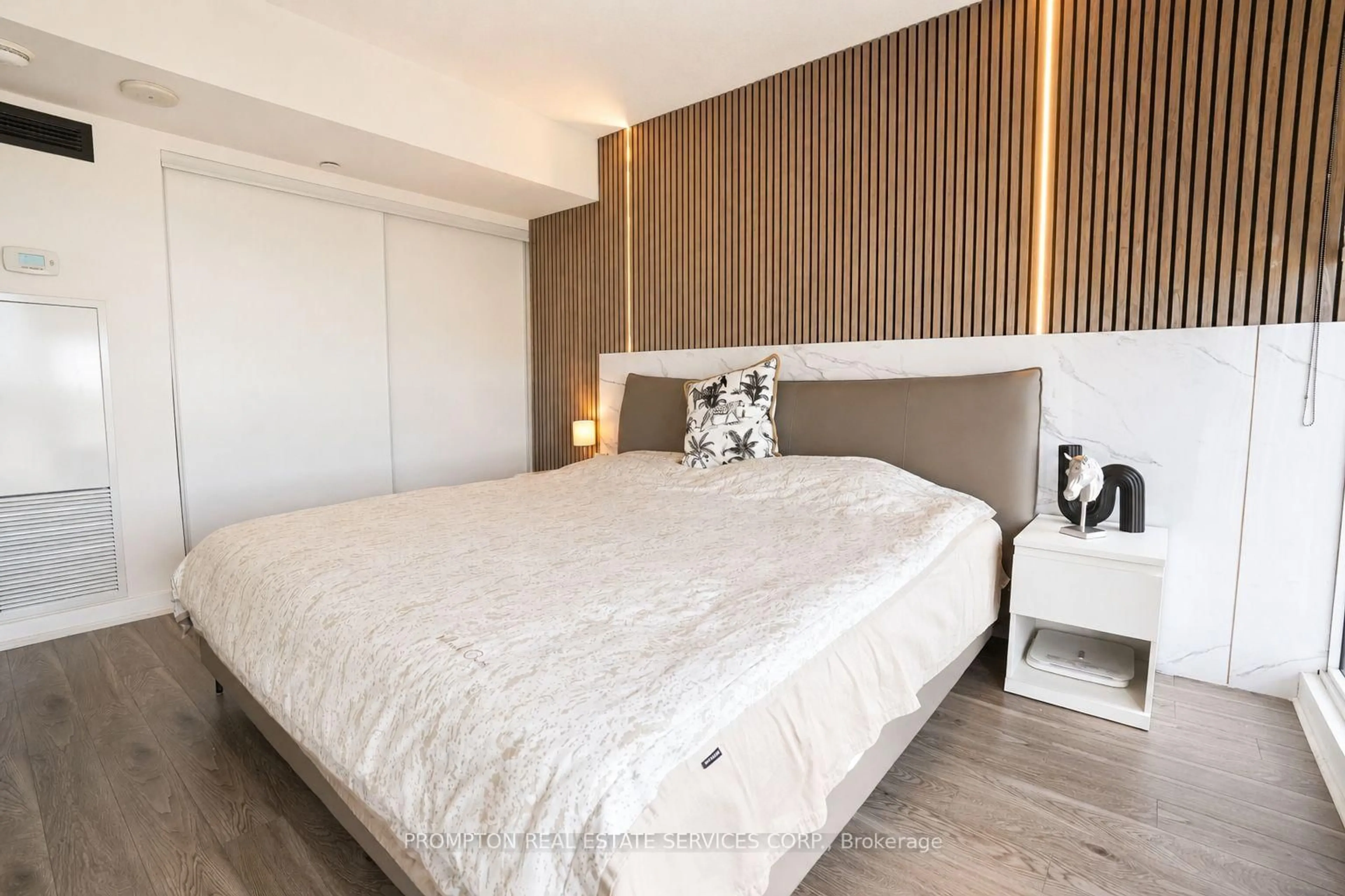 Bedroom with bed, wood/laminate floor for 72 Esther Shiner Blvd #717, Toronto Ontario M2K 2X9