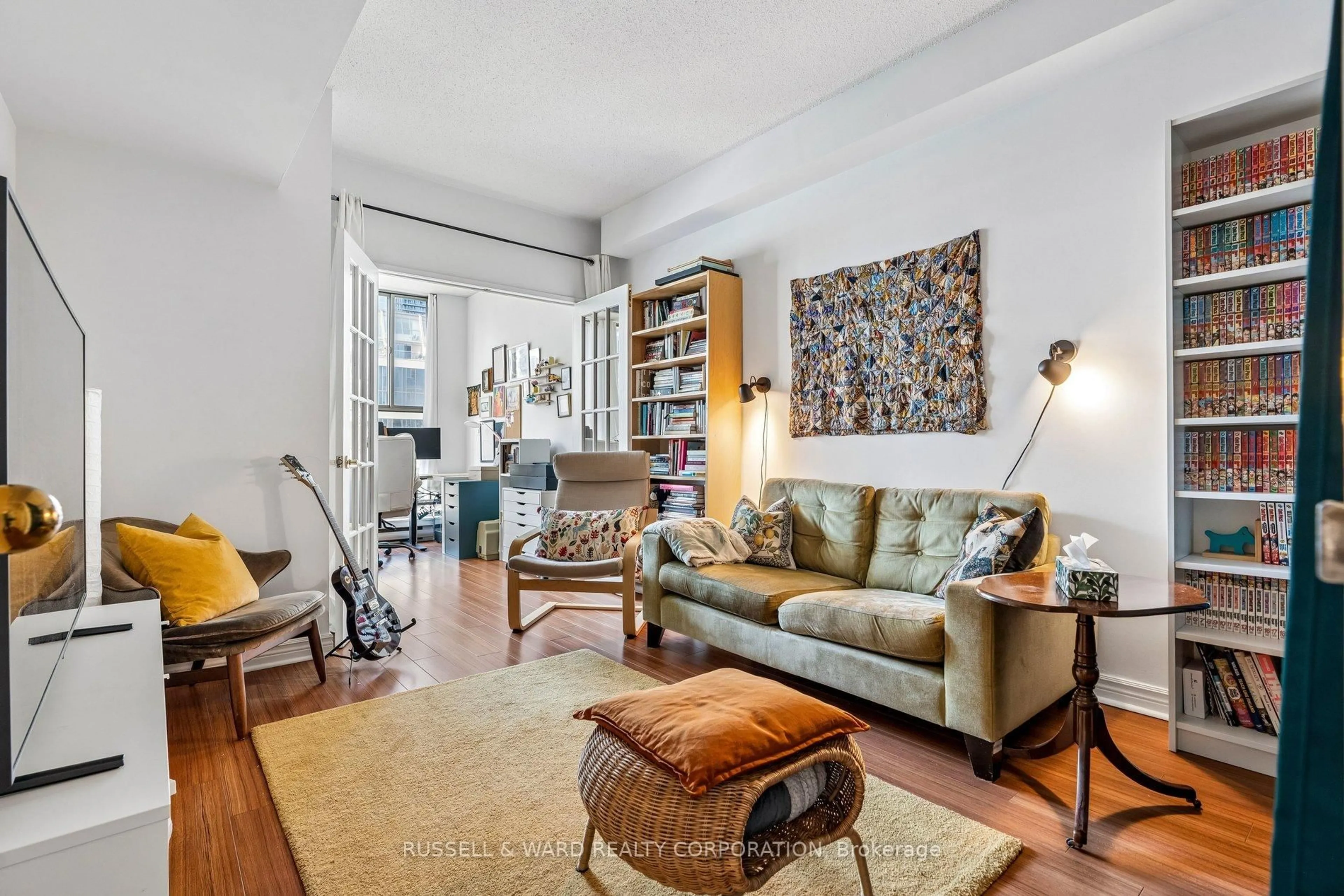 Living room with furniture, unknown for 65 Scadding Ave #911, Toronto Ontario M5A 4L1