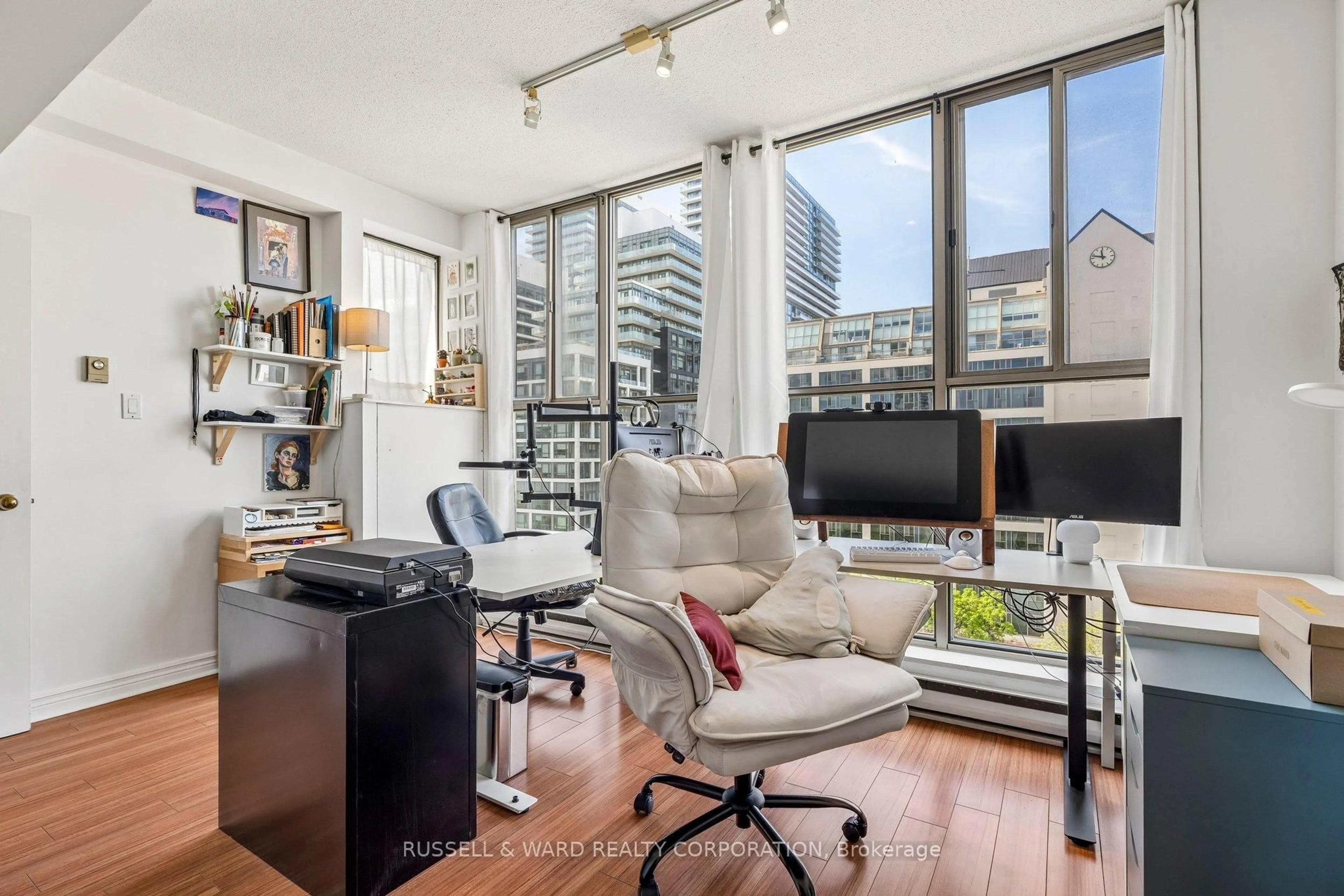 Living room with furniture, unknown for 65 Scadding Ave #911, Toronto Ontario M5A 4L1