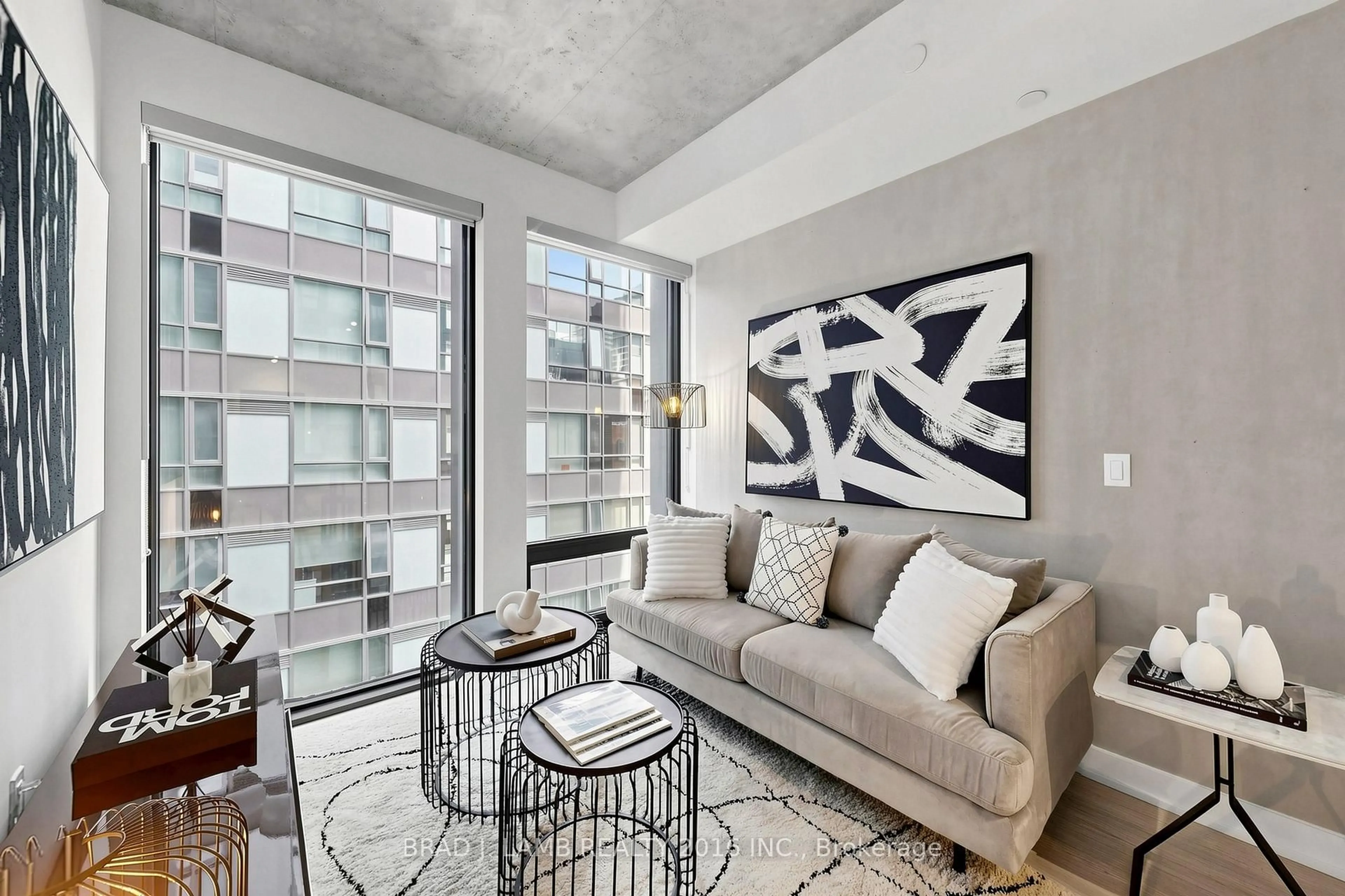 Living room with furniture, cement floor for 284 King St #701, Toronto Ontario M5A 1K4