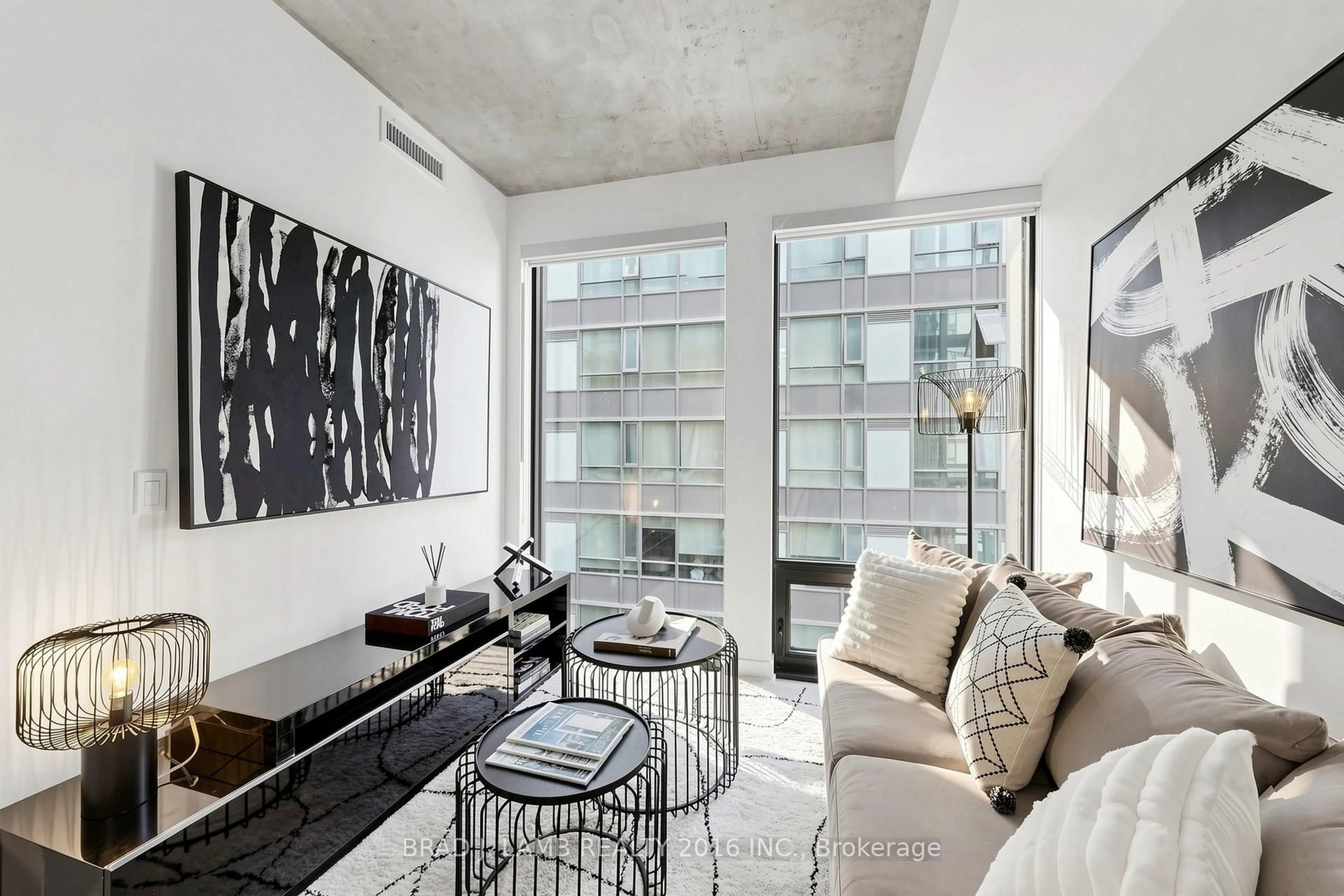 Living room with furniture, cement floor for 284 King St #701, Toronto Ontario M5A 1K4