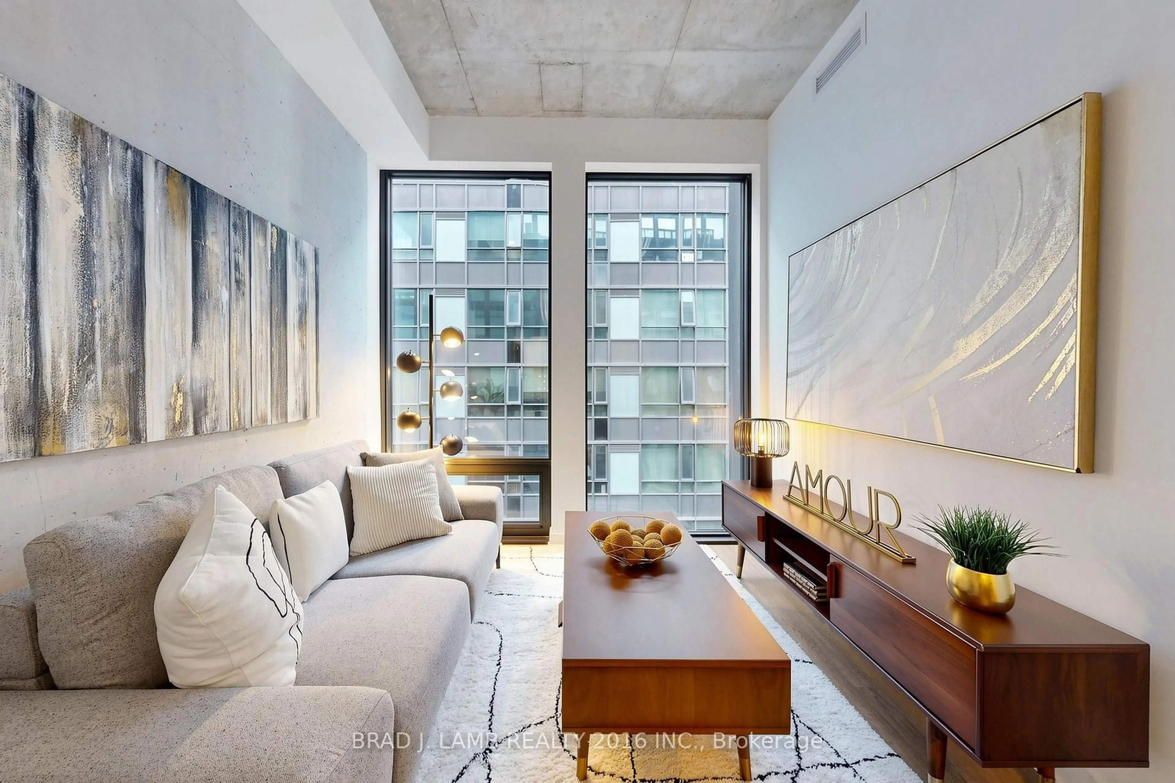 Living room with furniture, cement floor for 284 King St #808, Toronto Ontario M5A 1K4