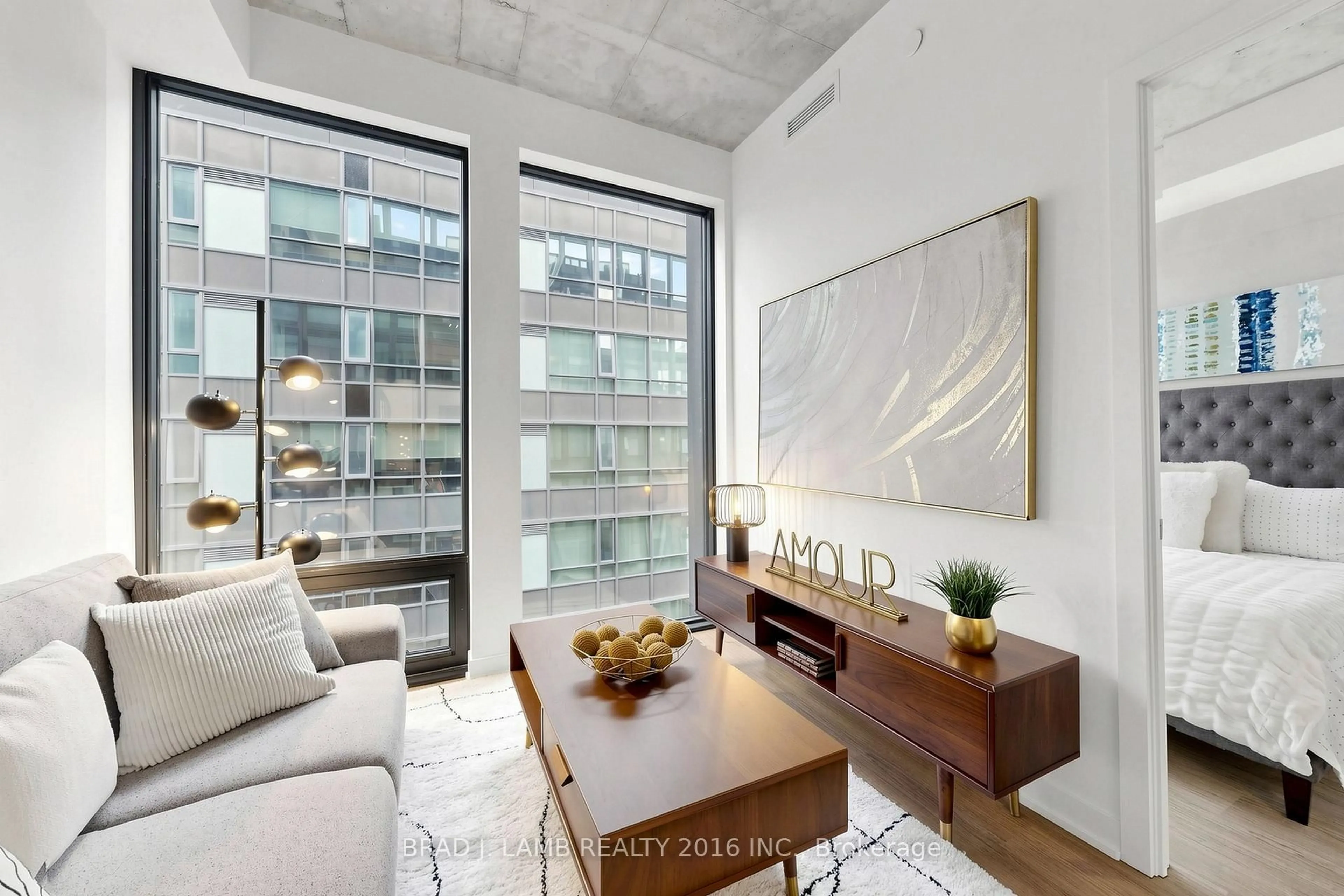 Living room with furniture, cement floor for 284 King St #808, Toronto Ontario M5A 1K4
