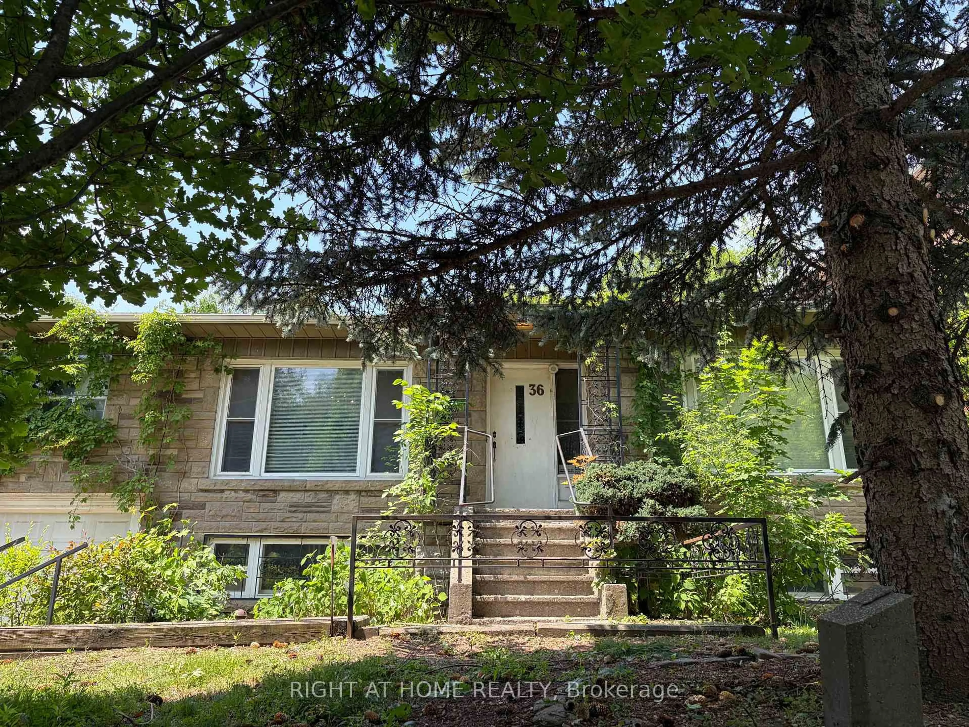 Home with vinyl exterior material, street for 36 Forest Wood, Toronto Ontario M5N 2V9