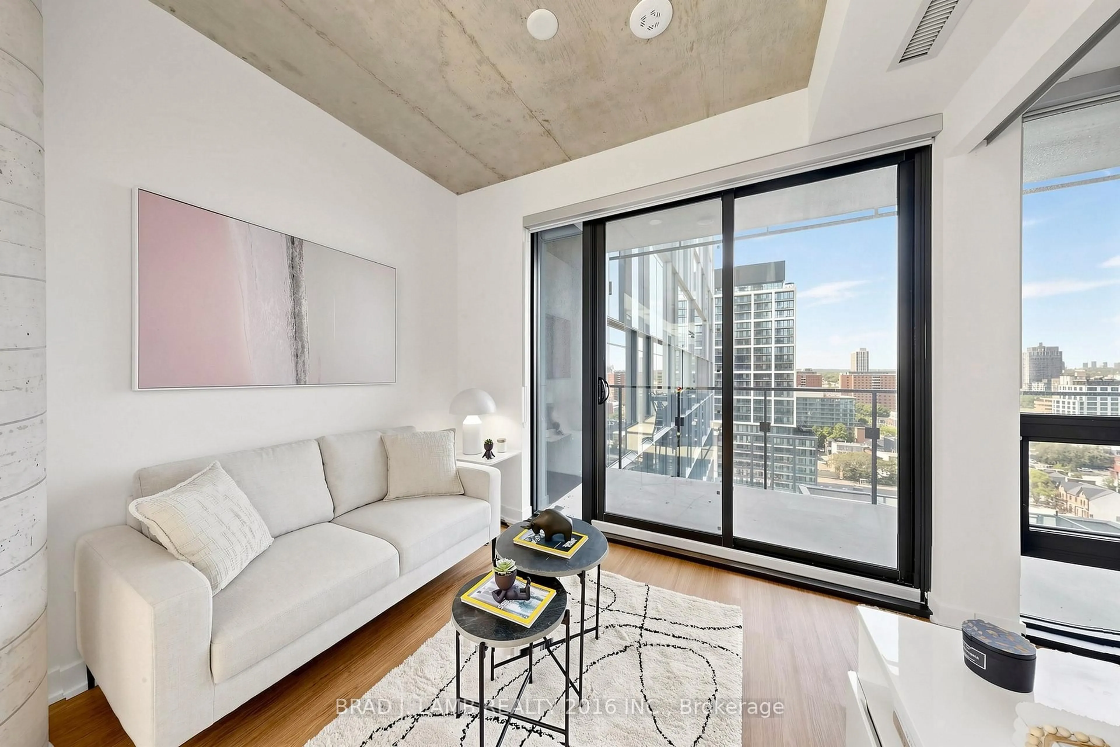 Living room with furniture, cement floor for 284 King St #1505, Toronto Ontario M5A 1K4