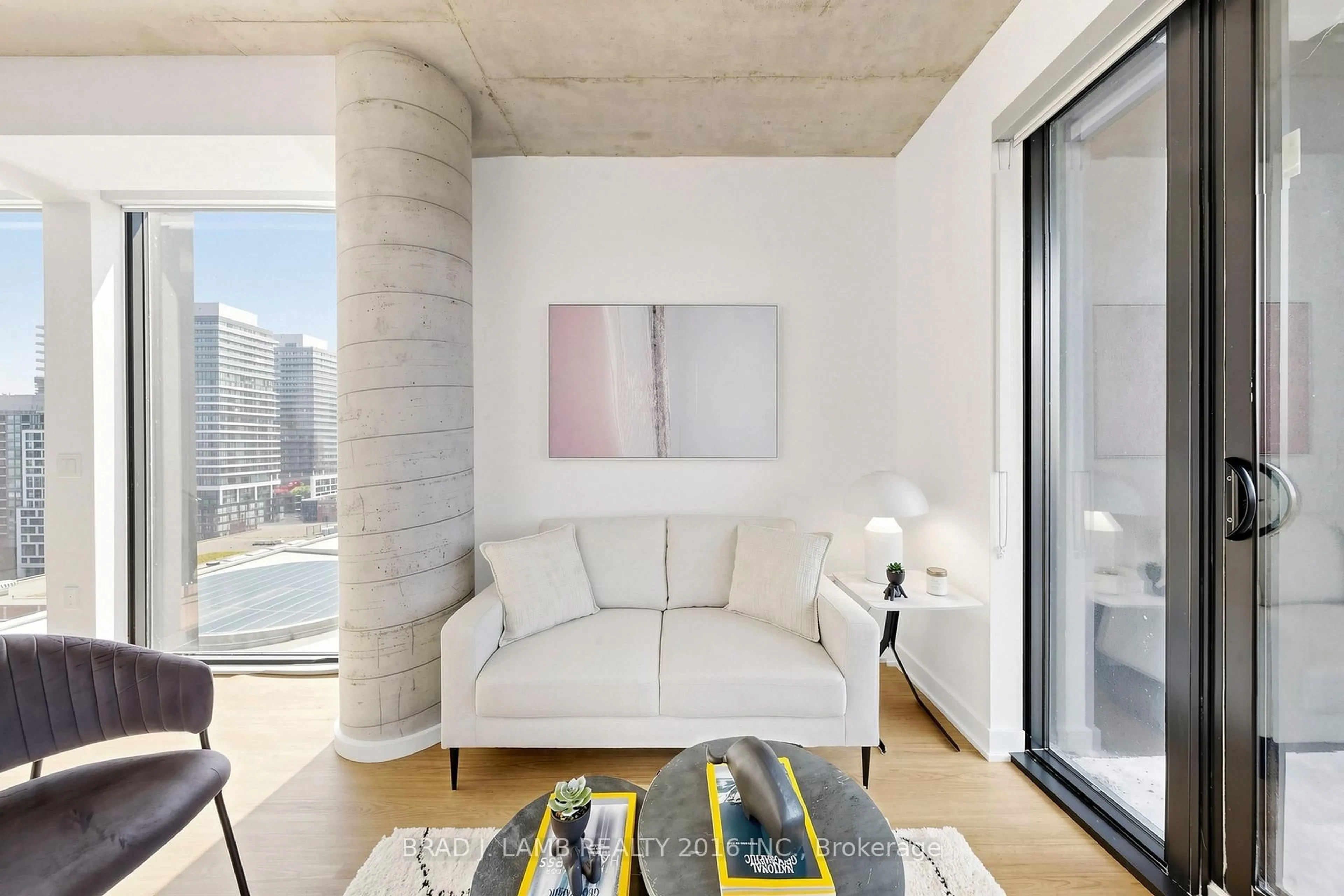 Living room with furniture, cement floor for 284 King St #1505, Toronto Ontario M5A 1K4
