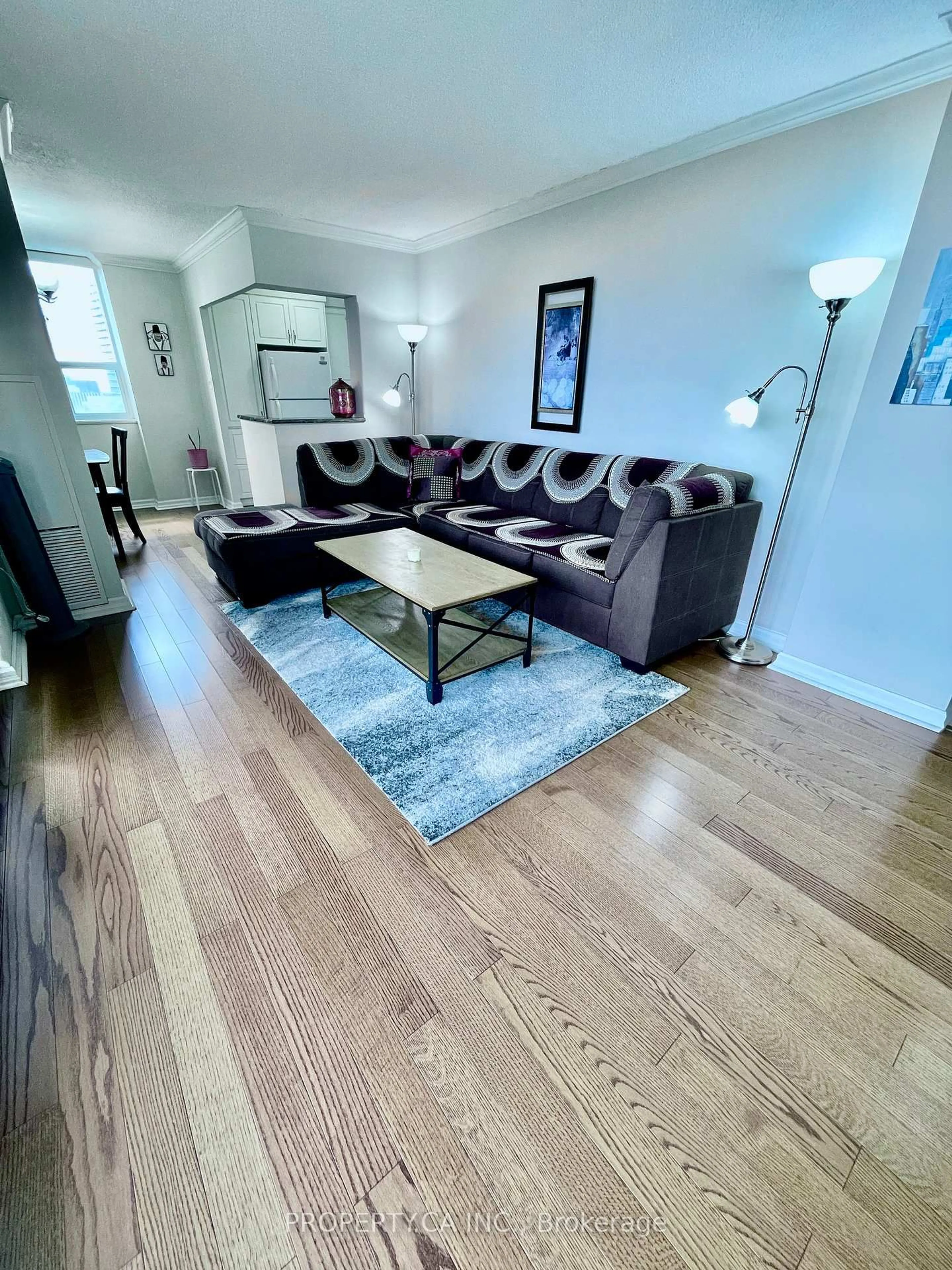 Living room with furniture, wood/laminate floor for 5 Old Sheppard Ave #1003, Toronto Ontario M2J 4K3