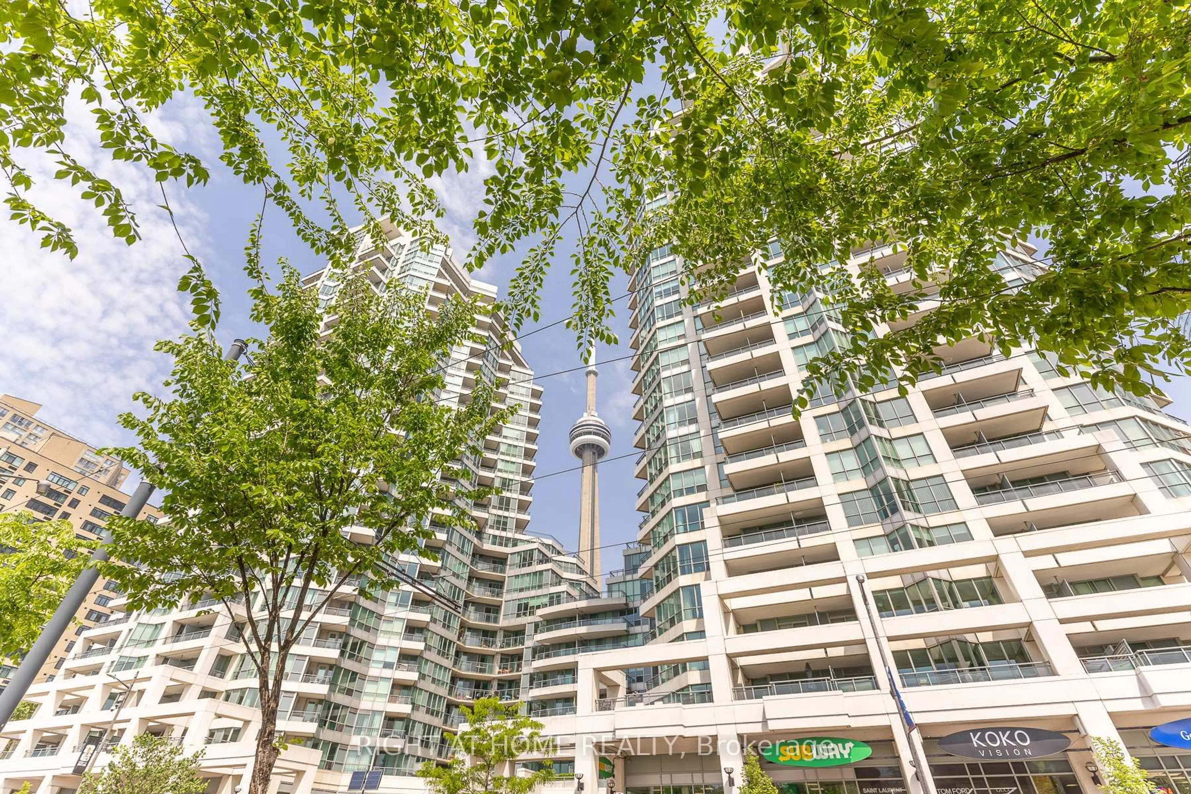 Patio, city buildings view from balcony for 228 Queens Quay #2801 (Ph 1), Toronto Ontario M5J 1B5