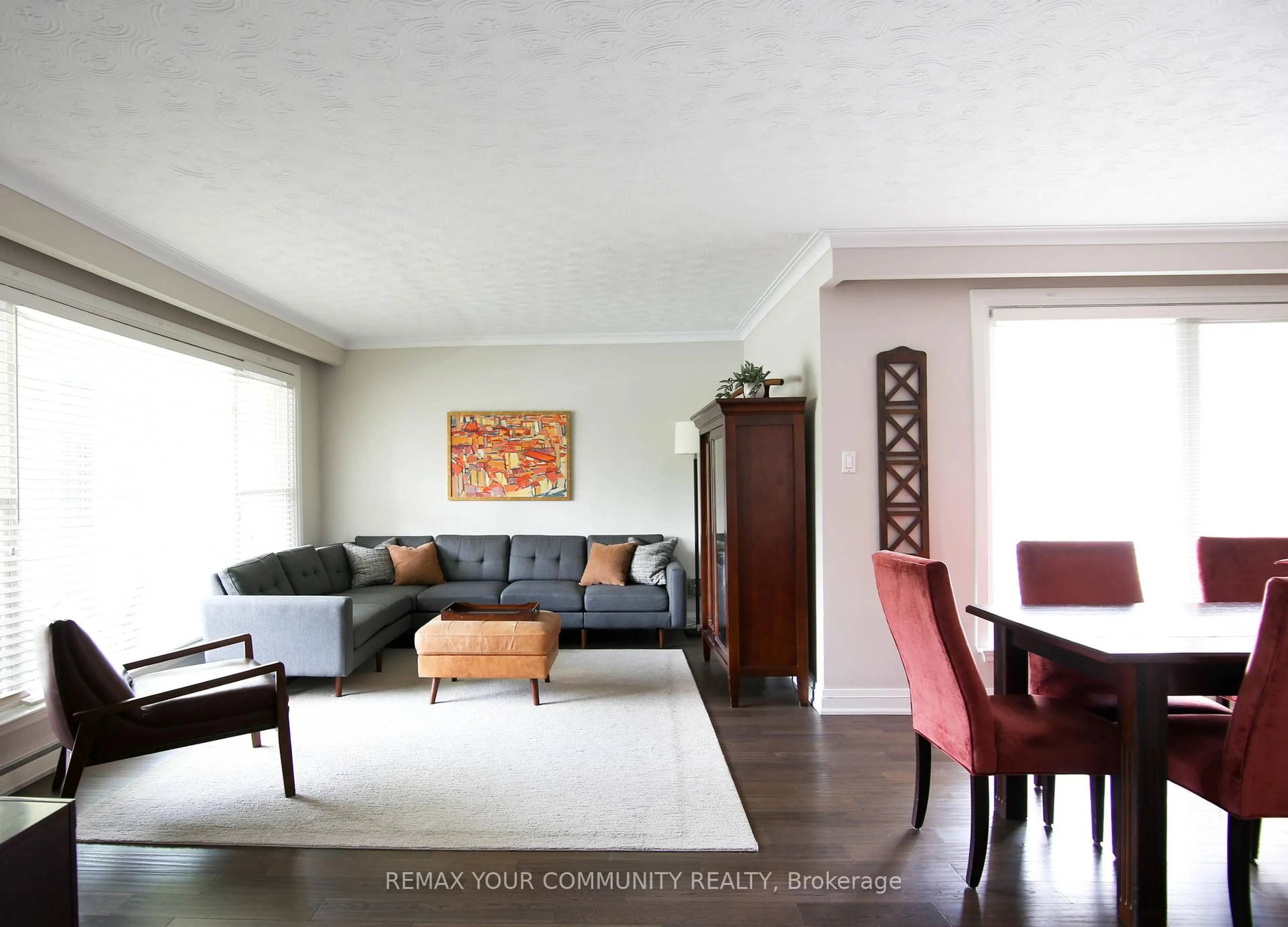 Living room with furniture, wood/laminate floor for 215 Honiton St, Toronto Ontario M3H 5N7