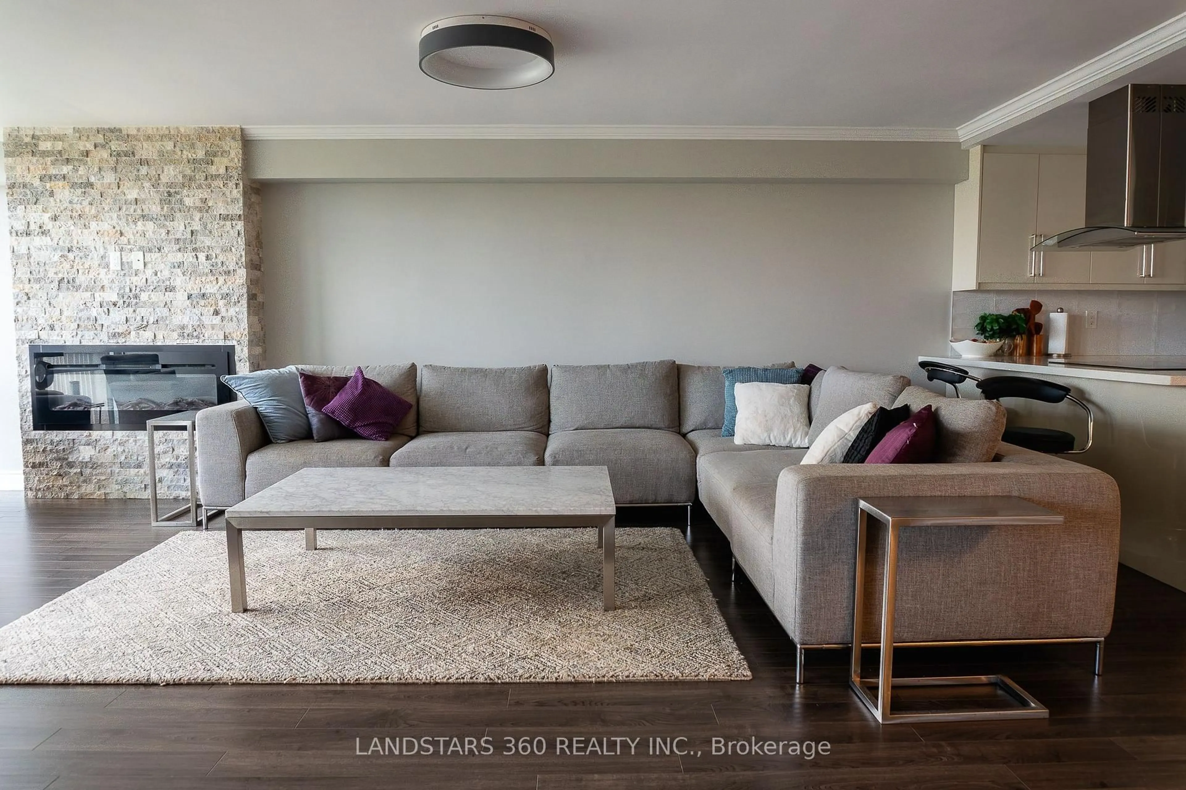 Living room with furniture, wood/laminate floor for 3303 Don Mills Rd #901, Toronto Ontario M2J 4T6