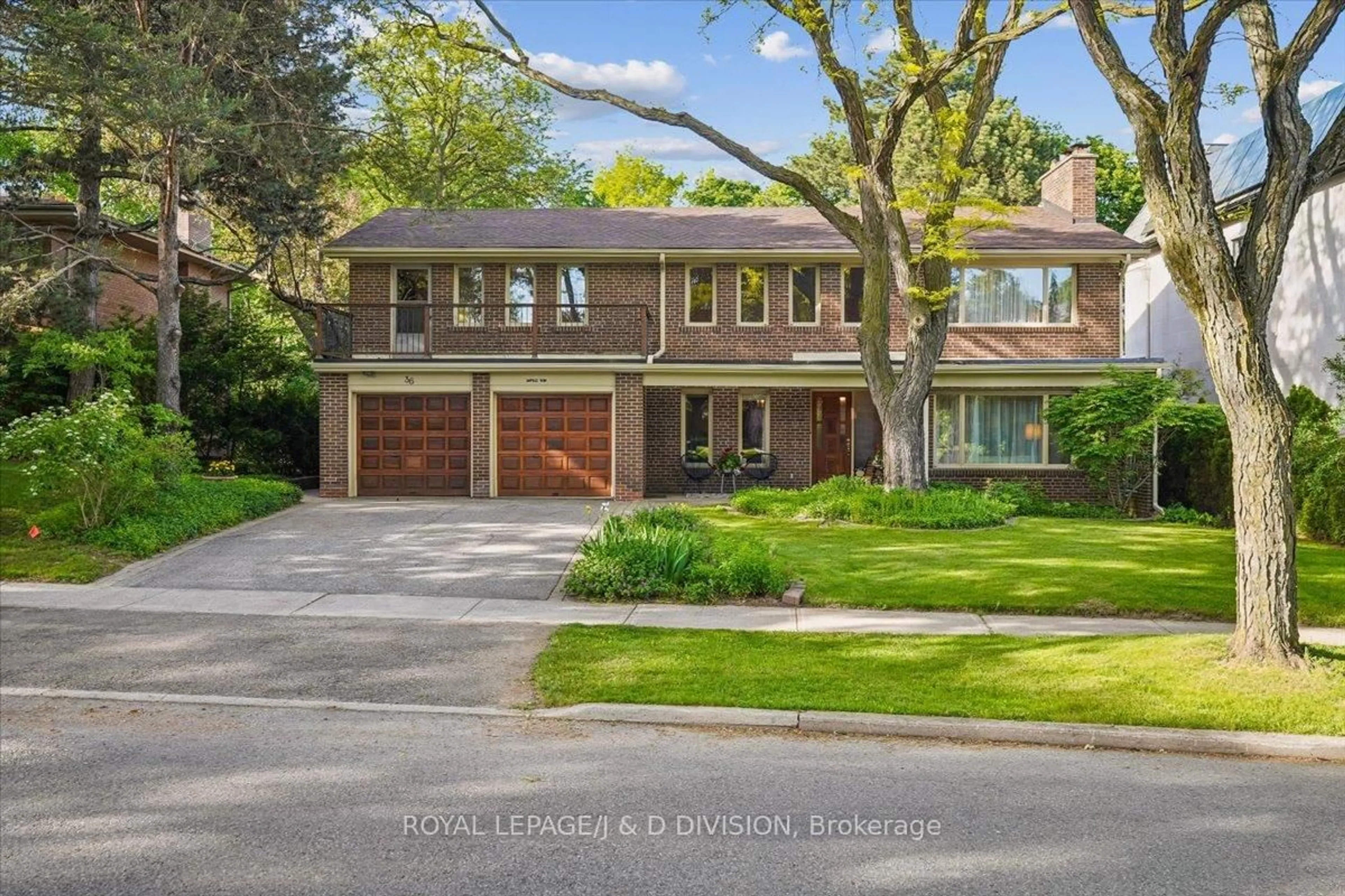 Home with brick exterior material, street for 36 Medalist Rd, Toronto Ontario M2P 1Y5