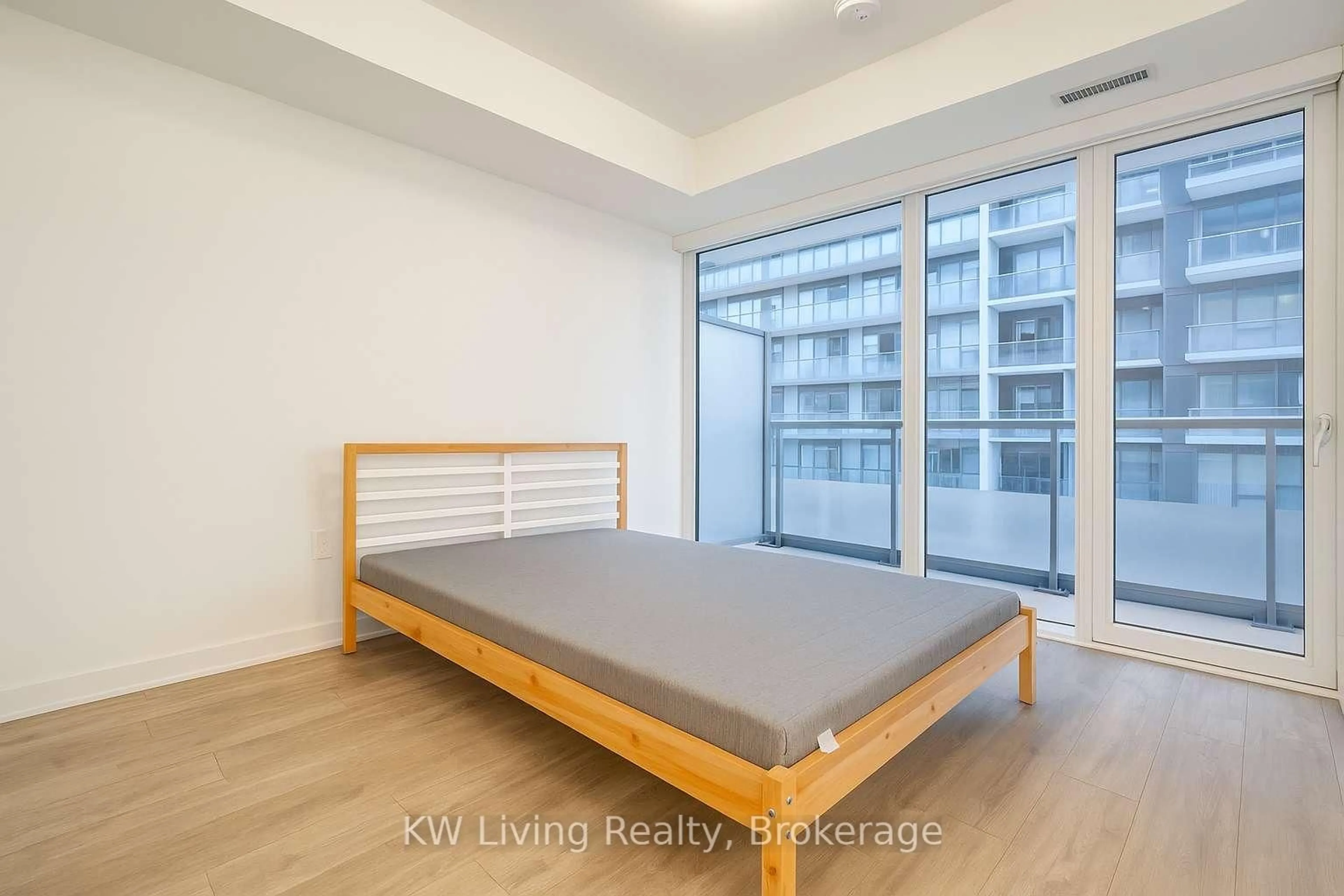 Bedroom with bed, wood/laminate floor for 70 Princess St #2010, Toronto Ontario M5A 0X6