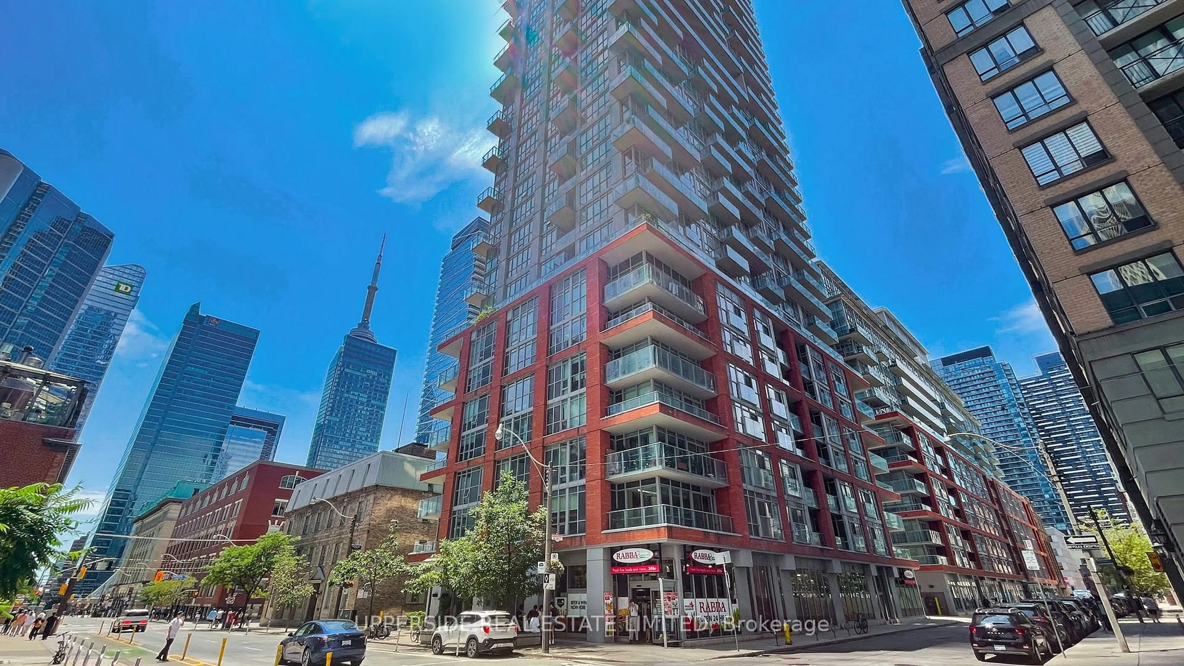 Patio, city buildings view from balcony for 126 Simcoe St #607, Toronto Ontario M5H 4E6