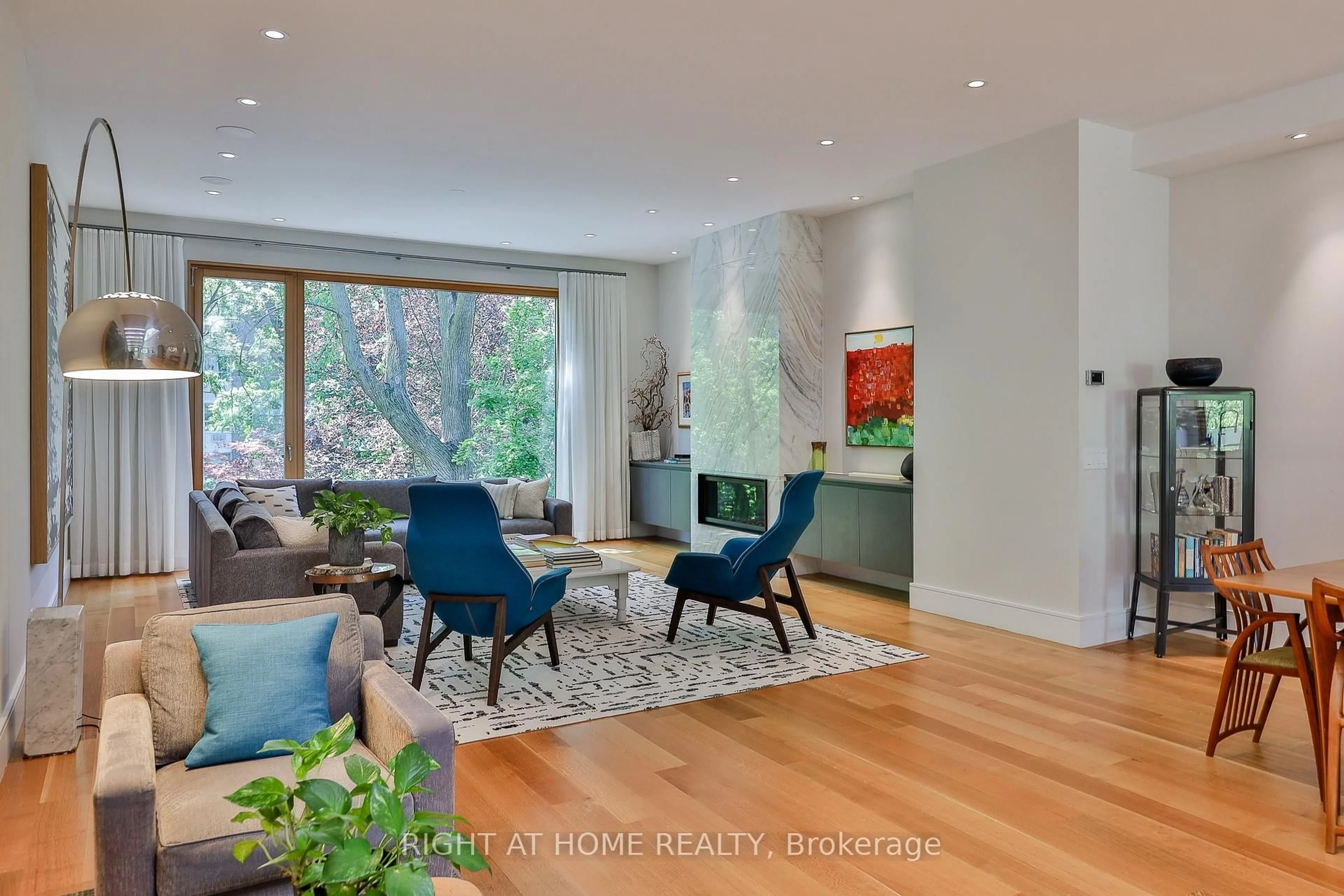 Living room with furniture, wood/laminate floor for 71 Heath St, Toronto Ontario M4V 1T2
