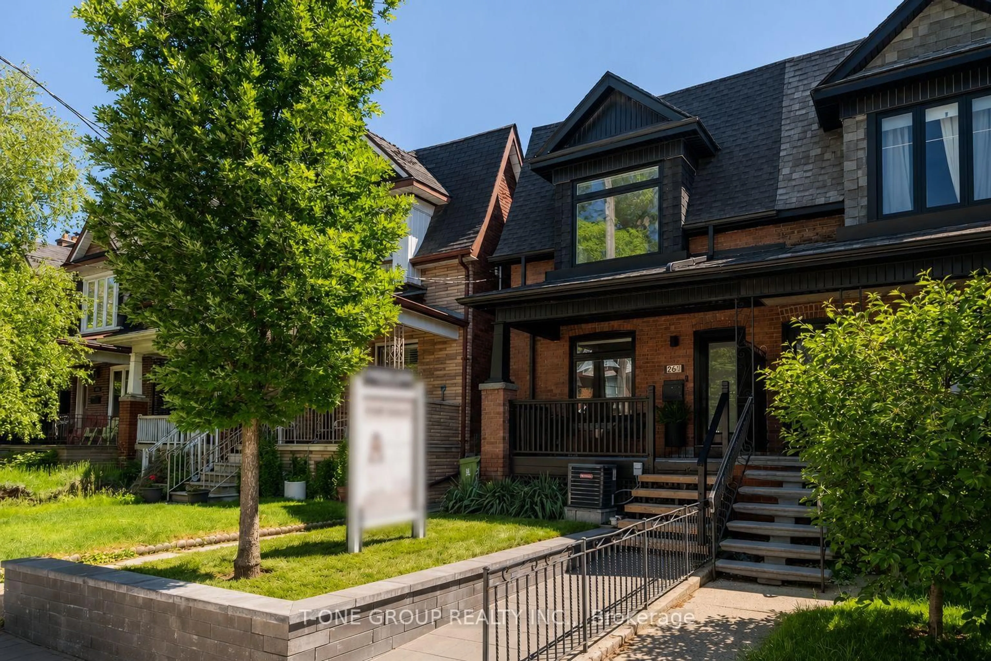 Home with brick exterior material, street for 261 Margueretta St, Toronto Ontario M6H 3S4