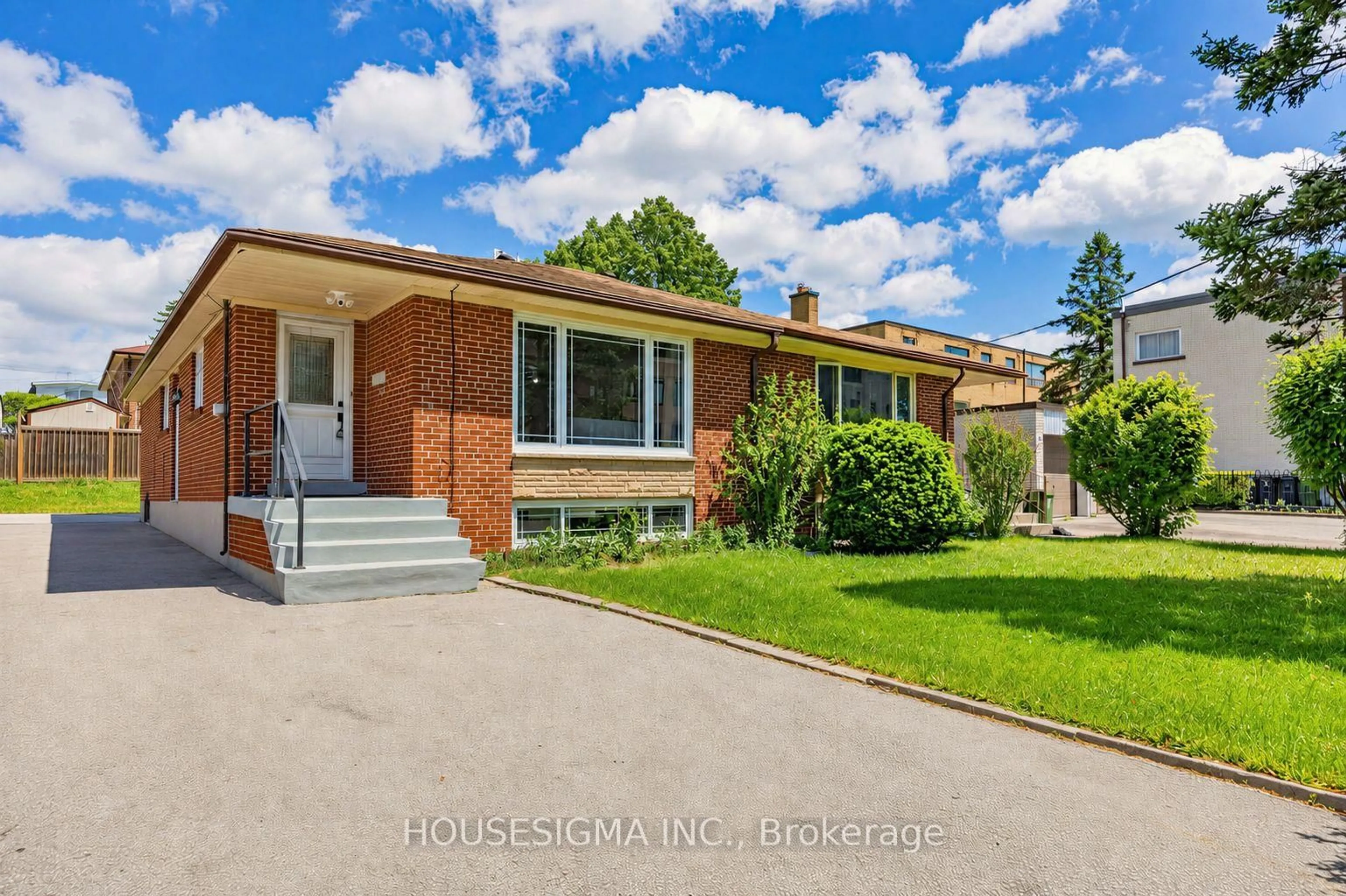 Home with brick exterior material, street for 51 Tisdale Ave, Toronto Ontario M4A 1Y6
