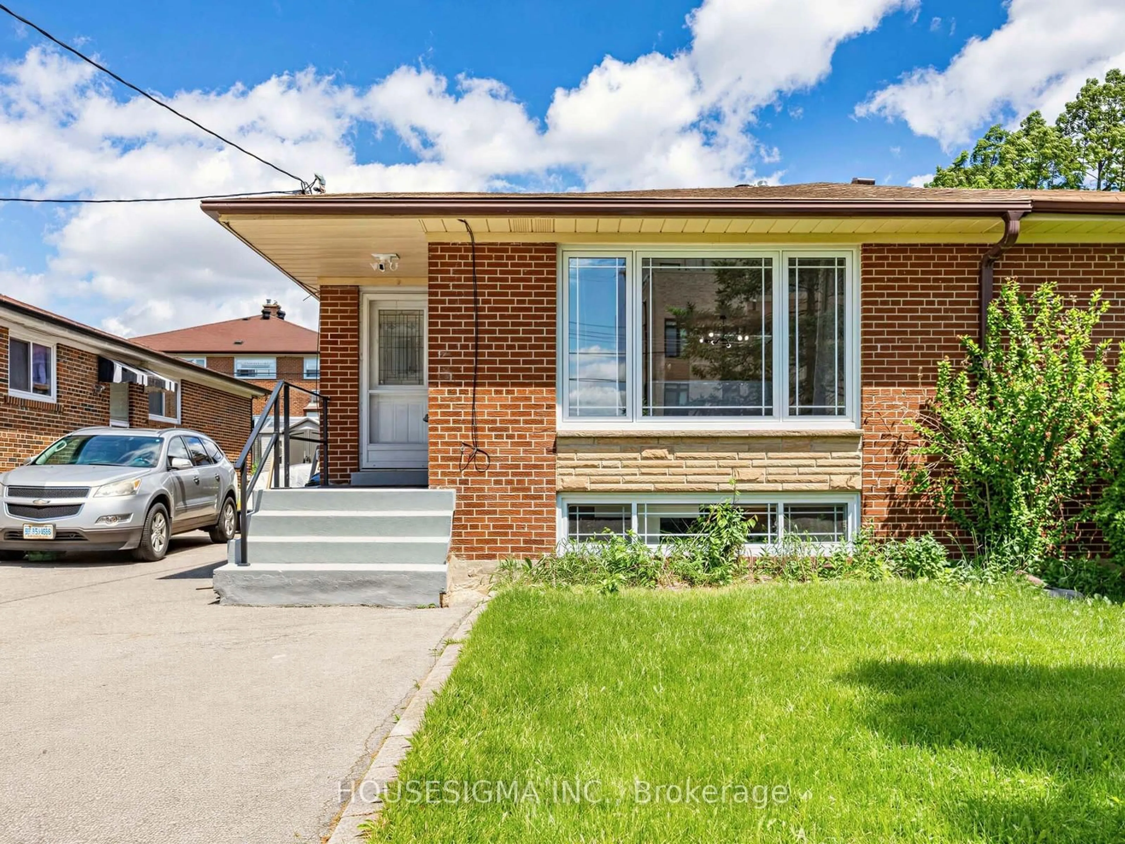 Home with brick exterior material, street for 51 Tisdale Ave, Toronto Ontario M4A 1Y6