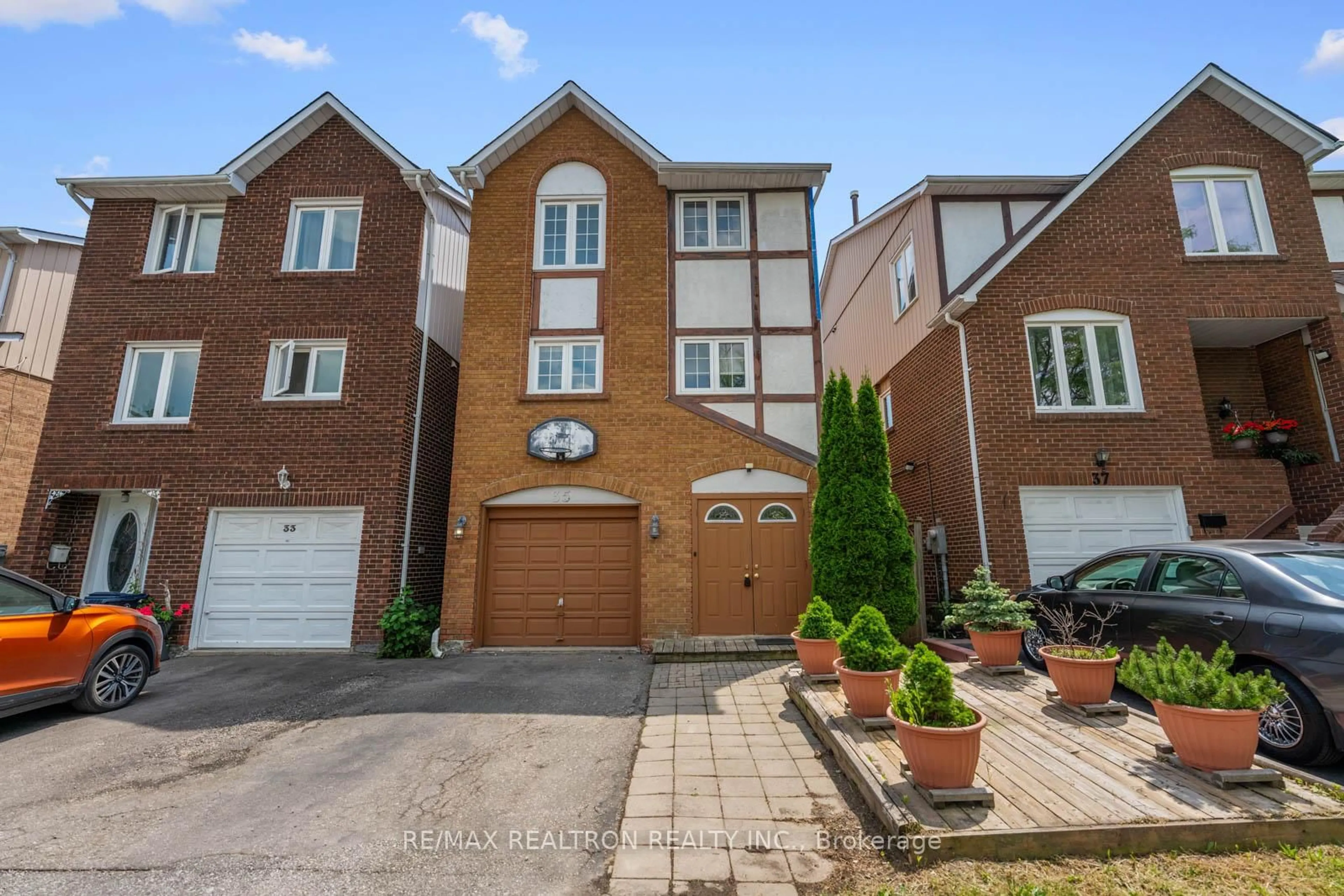 Home with brick exterior material, street for 35 Festival Dr, Toronto Ontario M2R 3T9